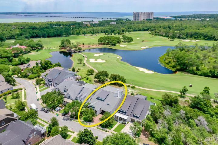 Desired Kelly Plantation Smart home  enjoys a beautiful site on the golf course. Inside, the 12' first-floor ceilings, abundant natural light, neutral colors, and quality finishes provide a great backdrop to showcase your lifestyle. Originally constructed in 2014, many upgrades were added in 2017, including incredible voice- and motion-activated technology that allows you to control the security, lighting, blinds, audio, video, and more without lifting a finger!
From the impressive brick entryway, the floorplan flows through a spacious foyer, past the double glass doors of the office (or second master bedroom) to a uniquely angled formal living and/or dining space, and then into a large living/family room with gas fireplace and open kitchen.
The kitchen features gorgeous quartzite countertops, luxurious black cabinets, a stainless sink, and new stainless appliances, including a Wolf gas cooktop with electric oven, large Subzero, and much more!
The home is oriented toward the sweeping vista of the 18th fairway of the Fred Couples Signature Golf Course--enjoy the relaxing and inspiring view of the soothing greens and blues including a lake and surrounding pine trees. A large theater room graces the upstairs, which also includes 2 bedroom suites, a lovely deck overlooking the golf course, and abundant storage. The home offers a wealth of great conveniences, including a steam shower in the master bath, spacious utility/mud room, 3-car (stacked) garage, and a lovely summer kitchen out back.
Just steps down the street lies the Kelly Plantation Clubhouse with its large pool. Tennis, golf, horseback riding, and the other great amenities of Kelly Plantation are also close at hand!