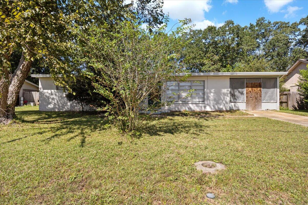 Investor opportunity and value-add potential in Pensacola! This 3-bedroom, 1-bath home offers a solid foundation with several key updates already completed, including a new roof (2022), new interior drywall and paint, new carpeting, and the home has been professionally cleaned. The bathroom features a walker-accessible walk-in tile shower.

The kitchen includes appliances (as-is) and opens to a covered patio area. A large detached shed on the property previously used as an artist's studio offers excellent storage or potential for renovation into a workshop, studio, or possible additional dwelling unit (buyer to verify).

Conveniently located on Montclair Road near Michigan Avenue, with easy access to shopping, dining, grocery stores, medical facilities, schools, parks, and major roadways. The Central Pensacola location allows for quick access to downtown, employment centers, and Pensacola's beaches.

Seller is motivated, and this home is ideal for investors, renovators, or buyers looking to create equity. Get your showing booked today!