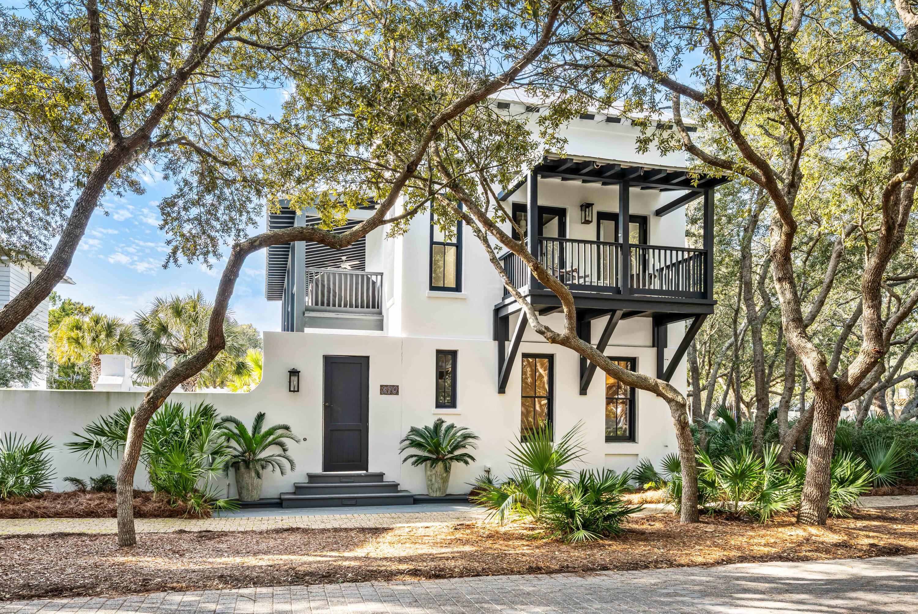 CORNER OF 'UPTOWN' & FUN - GREAT ROSEMARY BEACH  LOCATION -Home has EXPANSIVE PRIVATE COURTYARD W/ HEATED POOL & HOT-TUB, OUTSIDE FIREPLACE & STAINLESS GRILLING STATION. A HUGE COVERED PORCH overlooks the courtyard & provides OUTDOOR DINING & LIVING SPACE. MASTER SUITE on 1st floor overlooks courtyard, Guest room has en-suite bath on 1st floor & laundry. LIVING/DINING/KITCHEN on 2nd has 14' CEILINGS & FIREPLACE, wood FLOORS throughout,  MARBLE countertops, & THERMADOR range. LOFT BR makes 3rd BR in main house. 480 sf CARRIAGE HOUSE over 2-car GARAGE w/ EZ straight-in entry. 
Steps to the QUIET END OF THE BEACH, Racquet Club, & FITNESS CENTER w/ Indoor pool . Recently Renovated , this ''ALYS LOOK'' whitewashed home is LIKE NEW - list of recent upgrades coming soon w/ new photo