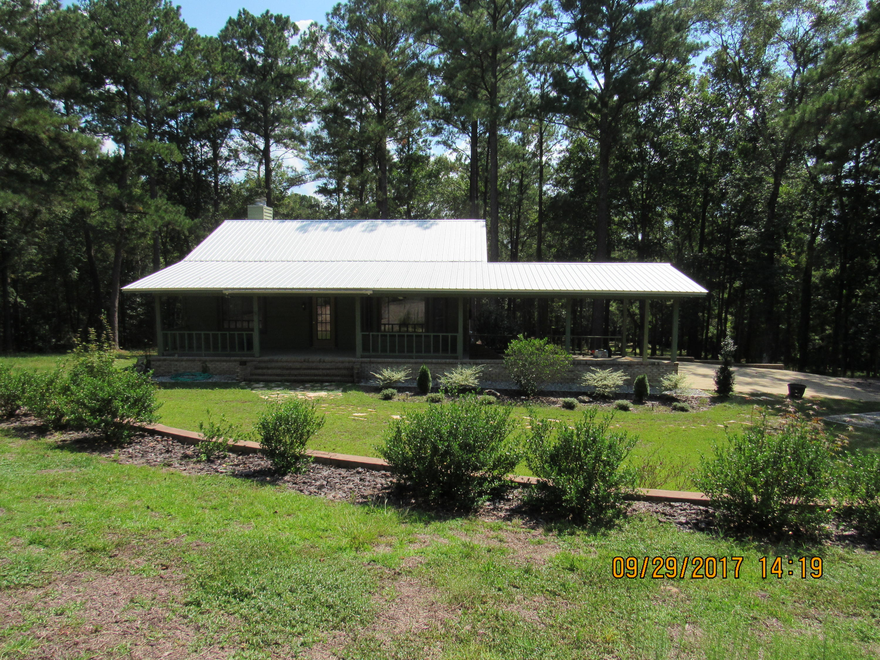 Available for immediate move-in! This charming custom home nestled on five partially wooded acres complete with its own meandering creek is full of elaborate, custom features including but not limited to two fire places (living room and master bedroom), a large covered front porch, spacious Florida room, hardwood and tile flooring, upgraded lighting and appliances, neutral paint, new carpet in the bedrooms, his and hers vanities in the master bath, and an elaborate fire pit out back. Enjoy the serenity of a country home while still being only minutes away from Defuniak Springs. Furnished and move-in ready! No inside smoking. Pets may be considered pending homeowner approval and with nonrefundable pet fee.