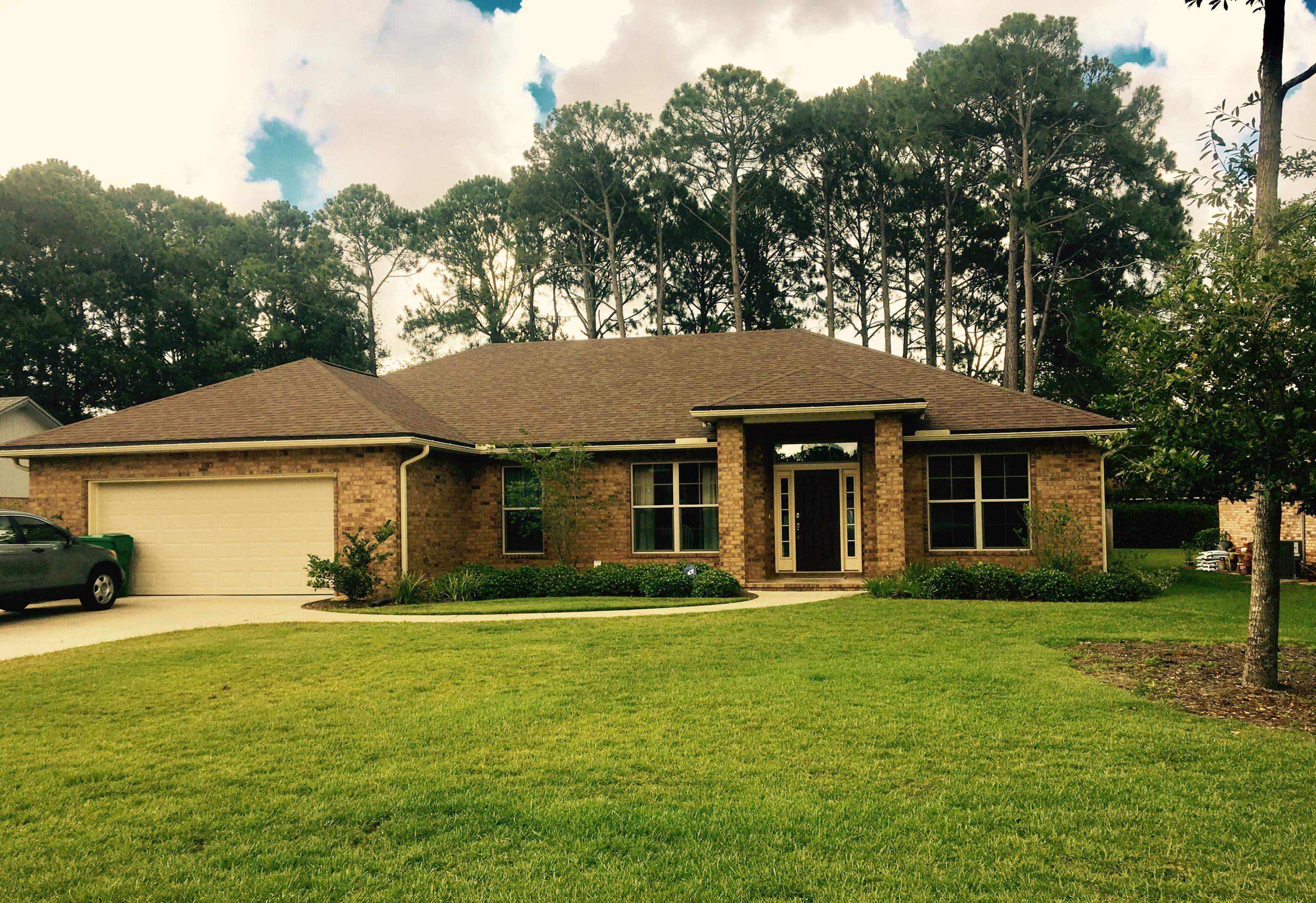 Great looking almost new home centrally located in Niceville! This 4 bedroom, 3 bath all BRICK home offers many special features with attention to detail including: Porcelain TILE in the kitchen, baths, foyer and living room. GRANITE counter tops in the kitchen along with STAINLESS STEEL appliances. Marble vanities in the bathrooms. Birch cabinetry throughout. Garden tub and separate marble shower in the master bath. Large fully fenced and landscaped back yard for privacy. Hurricane resistant IMPACT GLASS windows. SPRAY FOAM INSULATION in attic and efficient HVAC to save you money on utilities. The home features crown molding and tray ceilings in the dining room and great room.