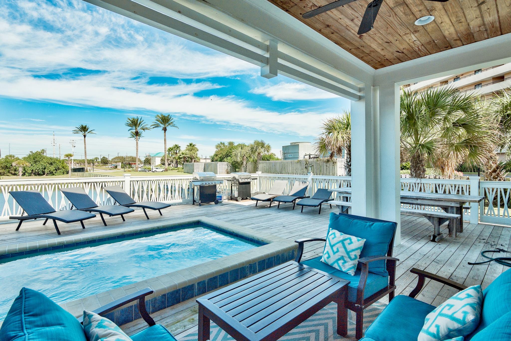 Lakefront coastal retreat with private pool and designer finishes just a short stroll to the private beach in gated Shipwatch. Rental projections for 2018 exceed $115K. Natural materials, clean lines, textures, and statement art elucidate a relaxed, modern coastal aesthetic. Its deep deck with ample seating, heated 12x10 plunge pool, and covered seating area extends over the lake, offering a unique waterfront experience. Large windows, neutral backdrops, and open interior spaces accentuate the calm, blue waters of the lake. The master suite offers a private lakefront balcony, two spacious closets, and a spa-inspired en suite with soaking tub, double vanities, standalone shower, and private water closet. A 2nd master suite with similar amenities is conveniently located on the main floor. All main floor spaces offer views of the lake. The designer kitchen features stainless steel appliances, white granite counters, white shaker cabinets, ample surface space for meal prep, and island with breakfast bar. The second-floor bunkroom includes a sitting area for reading or watching TV. Additionally, "H20" includes a two-car garage with an unprecedented 4 parking spaces. Furnishings convey in sale. Shipwatch is an exclusive gated community uniquely situated between a coastal lagoon and the Gulf of Mexico in the heart of Miramar Beach, offering over 400ft of private beach.