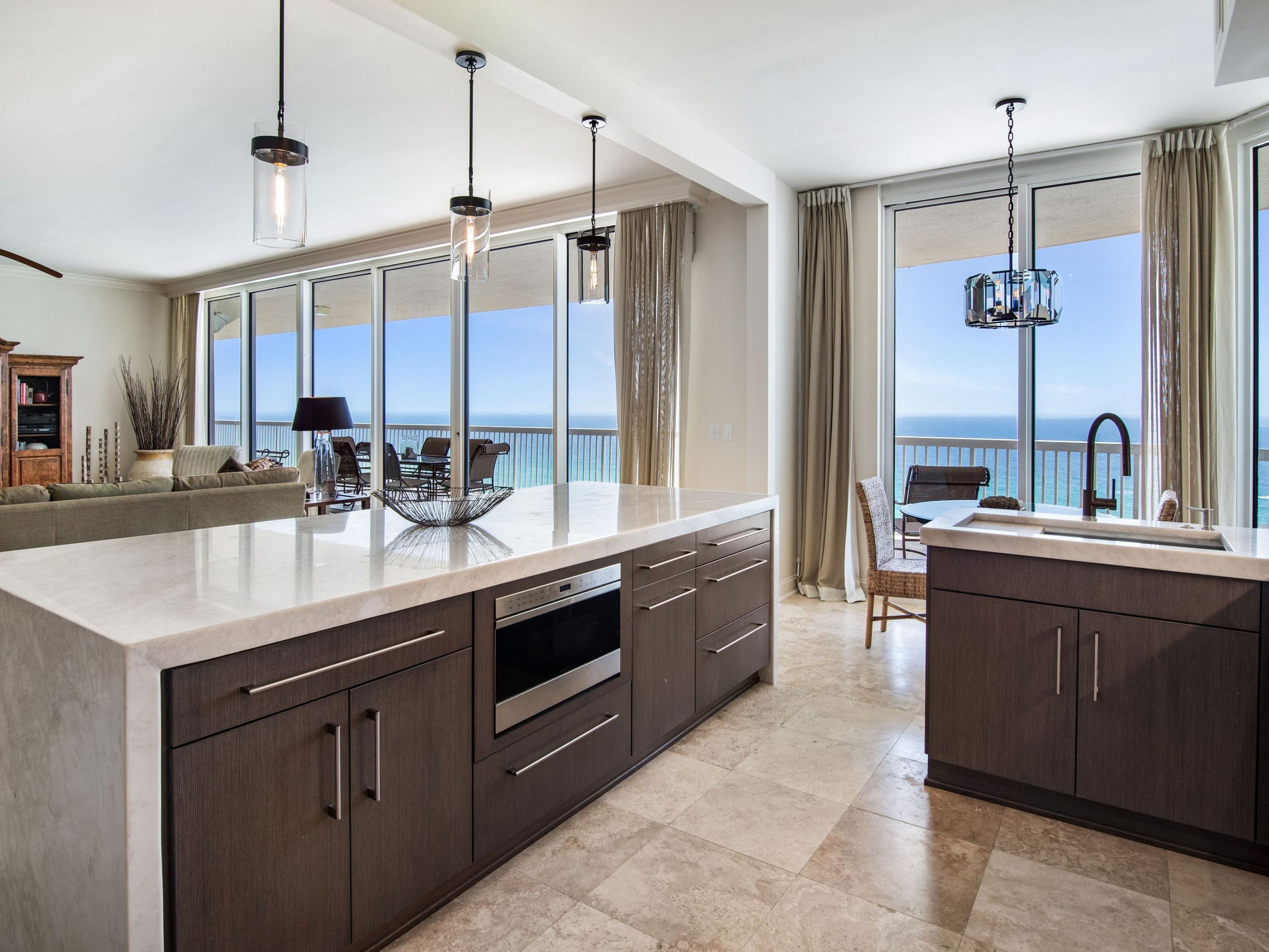 Enjoy incredible beachfront living and world-class amenities at the luxurious St. Thomas at Silver Shells Beach Resort in sought after Destin, FL. Amazing unobstructed views of the Gulf of Mexico, with a generous 80-foot wide balcony and luxurious features throughout, here is a one of a kind 3 bedroom, 3.5 bath condominium capturing the ultimate in relaxed sophistication that embodies the Florida lifestyle. The excellence begins from the moment you walk inside this 2,918 square foot retreat. With travertine flooring in the principal living areas, the spacious floor plan has high ceilings and floor to ceiling windows bringing in plenty of natural light. The large great room comes complete with wet bar, and dining area that can be closed off for privacy. The kitchen, with breakfast nook, offers quartz countertops and stainless steel appliances. Step outside and watch magnificent sunsets from the expansive balcony. The relaxing master bedroom has a dressing area and spa-like master bath. Two additional guest rooms have their own private bathrooms and all have access to the Gulf front balcony. A separate bunk room can be converted to an office or den. Living at St. Thomas in Silver Shells Resort includes sought after amenities, such as 1,000 feet of beachfront access, 7,500 square foot swimming pool, fitness center, spa, dining and more. Deeded garage parking, climate-controlled storage units, poolside cabana and semi-private elevators that open directly to each unit make this property a must-see. This rental restricted condominium complex offers the quintessential weekend, vacation getaway or full-time residence.