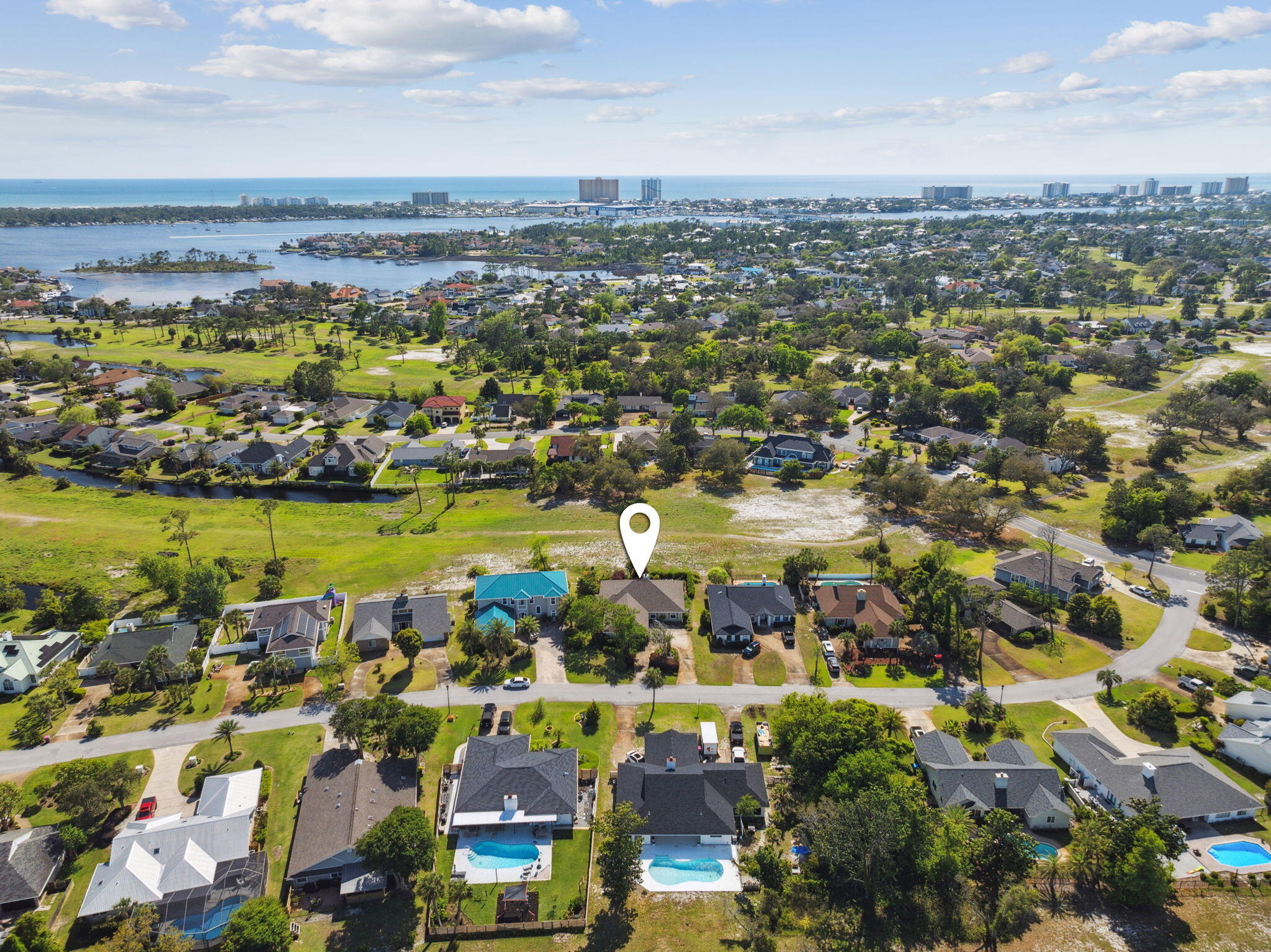 **608 Amberjack Drive | Bay Point**

Three-bedroom, two-bath home located in Bay Point, a gated golf course community with tennis courts and a full-service marina. This home has been recently updated with fresh interior paint and new flooring throughout. Additional features include a private hot tub and an open floor plan. Bay Point is a secure, established neighborhood with 24-hour security and access to golf, tennis, boating, and dining. This home offers a practical layout and low-maintenance living in one of Panama City Beach's most recognized communities. Home is staged and does not come furnished. Furnishings can be purchased separately.