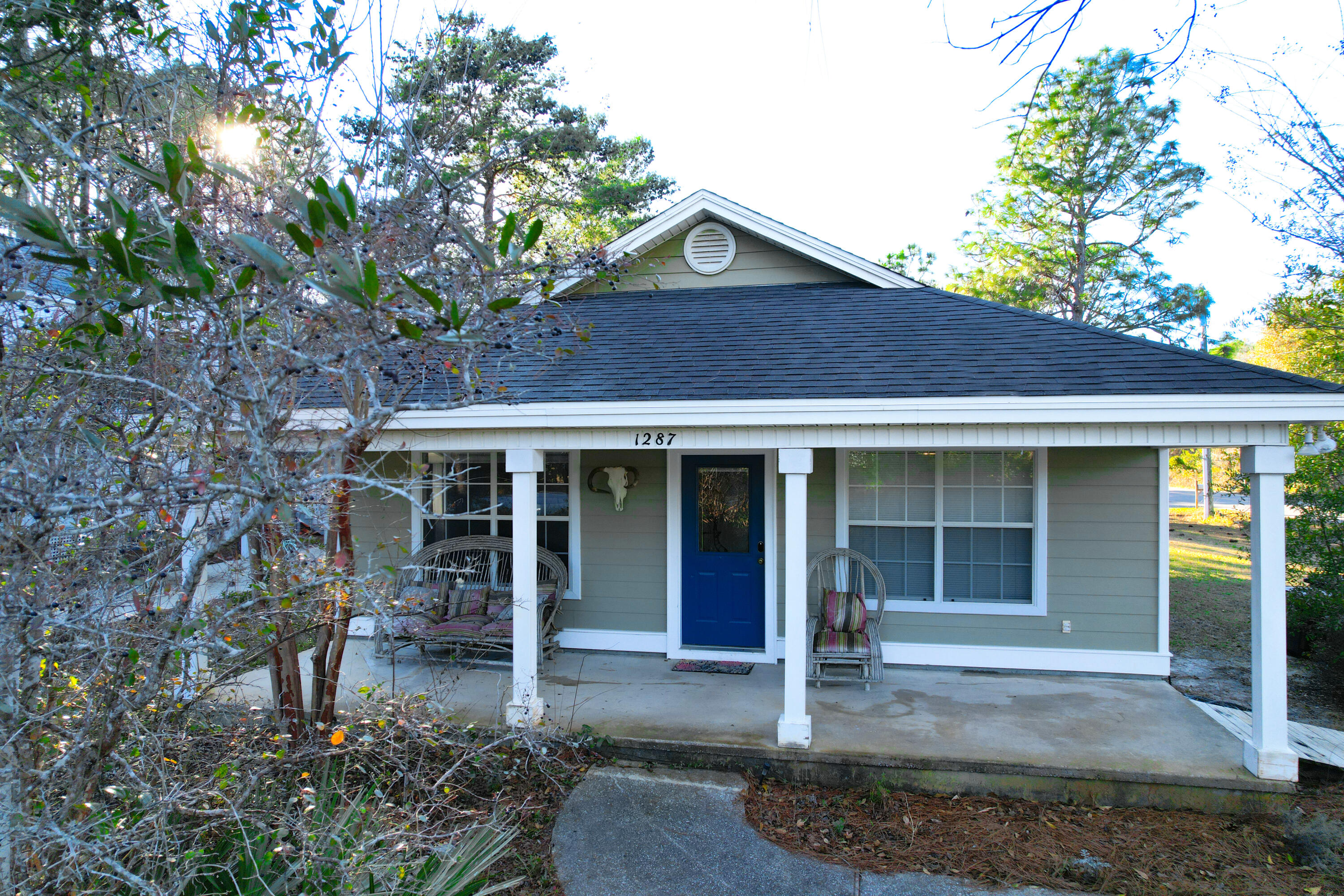 Welcome to this charming Florida cottage, your perfect place to call home! Located just one block from the bay and with no HOA, this single-story home offers an ideal coastal living experience. Enjoy ample outdoor space with large covered patios in both the front and back, perfect for relaxation and entertaining.

Inside, you'll discover a comfortable layout featuring three bedrooms and two bathrooms. The large backyard provides room for expansion, allowing you to customize the space according to your needs and preferences. The air conditioner has been recently upgraded in 2023, ensuring a cool and comfortable environment year-round. Additionally, the seller will be installing a new roof, further enhancing the property's value and durability.

Don't miss out on this incredible  opportunity to own a home in the historic Daughettes neighborhood, conveniently located just north of Grayton Beach. You'll appreciate the easy access to the bike path, which now runs directly in front of 1287 and extends all the way to 30A. This offers a wonderful way to explore the area and enjoy outdoor activities. Furthermore, getting to Grayton Beach or Seaside has become even more convenient with the availability of a shuttle service.

Make this delightful cottage your own and embrace the beachside lifestyle. Take advantage of the unique features and prime location offered by this property in The Daughettes. Don't waitschedule a viewing today and seize this fantastic opportunity!