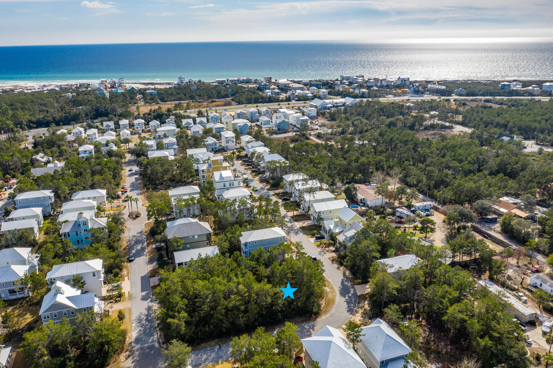 Rare and amazing corner lot in one of the most desirable neighborhoods in Inlet Beach. Seller also owns the two adjoining lots, corner and interior, and both are available for purchase. Grande Pointe is a highly sought after community with great amenities featuring large pool overlooking Lake Powel, Club House and  lake access with dock . The beach is just a short walk, bike ride or golf cart ride. Restaurants and shops are all within walking distance.