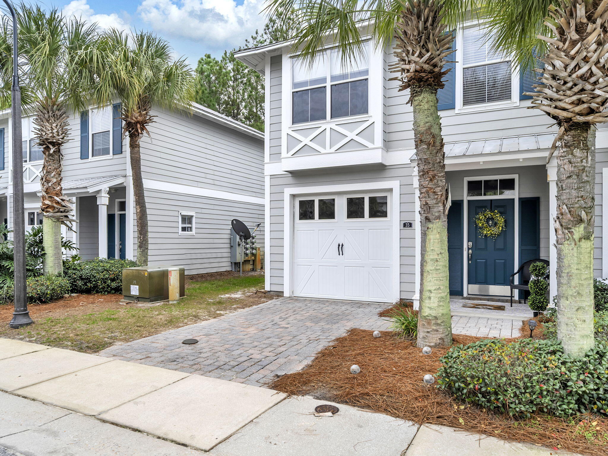 Welcome to 35 Talon Court, a beautifully maintained END unit townhome nestled on a quiet street, offering comfort, convenience, and low-maintenance living all within a 5 minute walk to the BAY. This inviting residence features a thoughtfully designed layout with bright, open spaces ideal for both everyday living and entertaining. The main living area is filled with natural light and flows seamlessly into the kitchen and dining space, creating a warm and functional environment. All three bedrooms can be found on the second floor along with two bathrooms for ultimate privacy. Some key upgrades include: luxury vinyl plank flooring throughout, crown moulding, all new stainless steel LG appliances, and a hot water heater that is approximately 4 years old! A 1-car garage adds everyday convenience and extra storage, while the outdoor space off the living room offers a perfect spot for morning coffee or evening relaxation. With exterior maintenance handled by the association, this townhome delivers an easy, lock-and-leave lifestyle, and allows more time for enjoying the beach life! Conveniently located near shopping, dining, schools, and more, Eagle Bay, combines peaceful townhome living with easy access to everything you need. The community has fiber optic internet for fast reliable speeds, is within a 10 minute drive to the most gorgeous beaches, AND has a restaurant RIGHT nearby that offers pool/food memberships!! Call for a showing today!