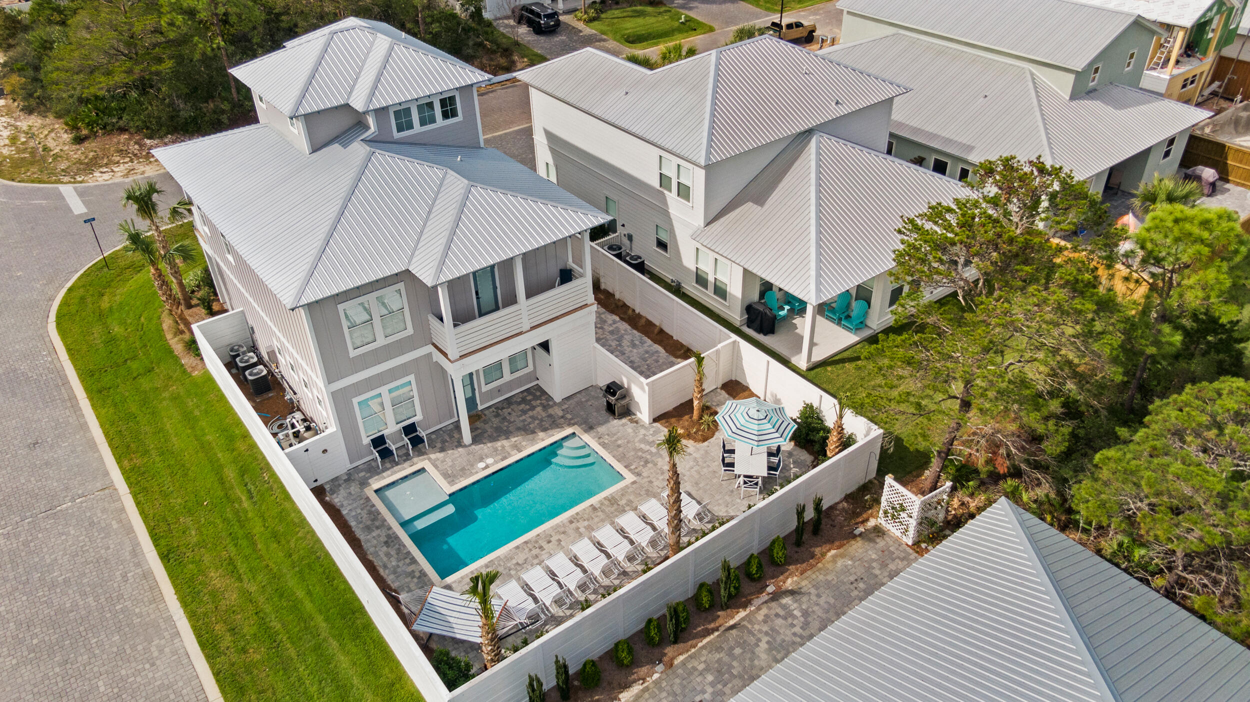 The Lazy Magnolia is a newly built, home away from home! The Lazy Magnolia is a  7 Bedroom, 7.5 Bath home that sleeps up to 24. The home is 3 stories, decorated with an elegant farmhouse style, making it very cozy and very relaxing! The home features it's very own private pool with a kiddie/tanning area attached. The community is located off of scenic highway 98, very close to the popular Whale's Tale restaurant and beach access. There's a private, designated beach access for you right outside of the community.  Also within 2 miles of the home are countless restaurants, Grocery Stores, gas station, CVS Pharmacy, 2 large and popular public beach accesses, and much more! Call for your private showing today.