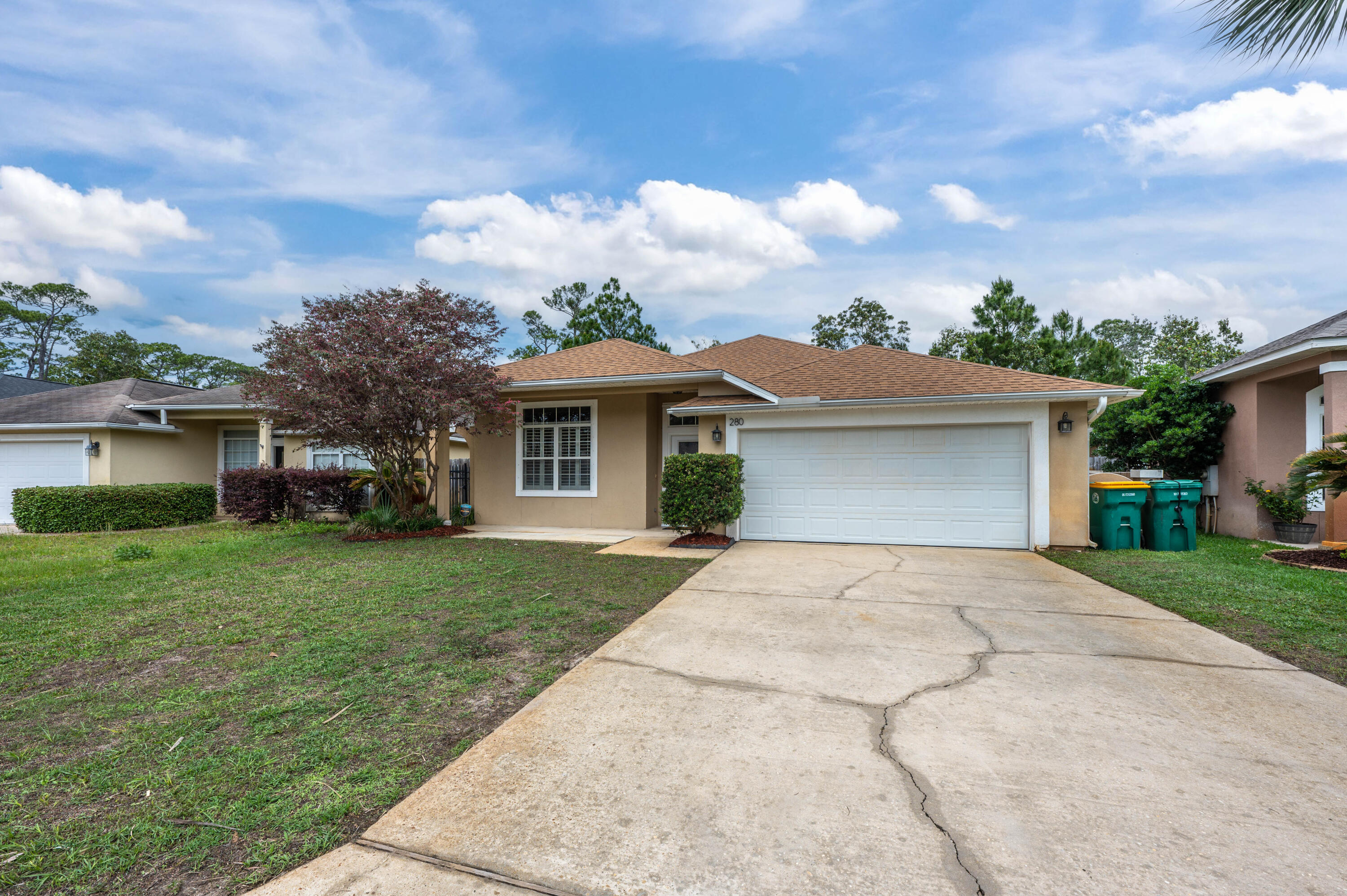 Gated community, bright & spacious, custom built - don't let this Mary Esther home get away. With 4BR & 2BA, this gem located just outside of Fort Walton Beach features beautiful hardwood floors, tray ceilings & wainscoting at the entry and through the formal dining space. A gourmet kitchen features cherry wood cabinets, granite countertops, a center island, stainless steel appliances, a large pantry & high top breakfast bar. A separate laundry room, screened in porch, large outdoor wooden deck & open concept living space elevate the home. The master suite is outfitted with an en suite, double vanity bathroom, soaking tub, walk-in shower & double walk-in closets. Situated just outside of Hurlburt Field & downtown Fort Walton, be at the center of it all while maintaining privacy & security.