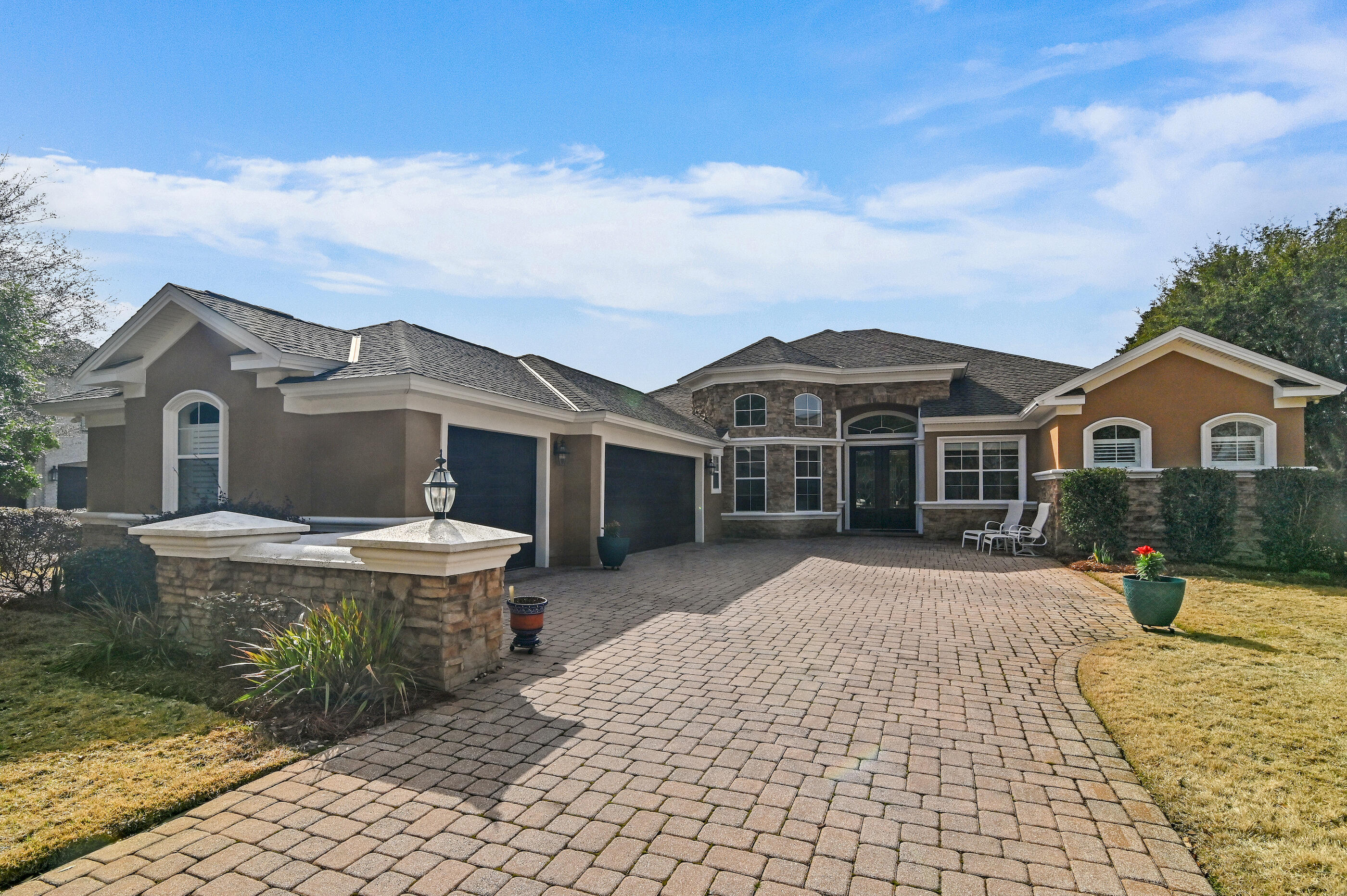 Experience luxury living in this immaculate 4-bedroom, 3-bath home with an office, ideally situated in the coveted Kelly Plantation community. Enjoy breathtaking views of the 13th fairway, green, and lake from your expansive 0.61-acre lot. The open, single-level layout features a split floor plan, high ceilings, and over $125K in recent upgrades--including a new roof, new garage doors, LVP flooring, granite countertops, and freshly painted interiors. The updated kitchen features granite countertops, a new dishwasher, and custom cabinetry, while a modern electric fireplace and a ceiling fan enhance the living room. Step outside to a private pool and spa with a newer enclosure and equipment, surrounded by updated landscaping and a boundary hedge for extra privacy. See More........... Additional highlights include a 3-car garage with refinished floors, new LED lighting, upgraded HVAC and irrigation systems, security cameras, and a Sentricon termite prevention system. Perfectly located for quick golf cart access to the beach, bay, shopping, and dining, this home is move-in ready and designed for effortless coastal living.