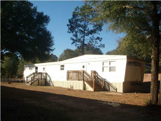 OPEN LIVING AREA. QUIET PARK WITH JUST 8 UNITS. RENT INCLUDES WATER, SEWER & GARBAGE PICK UP. SECURITY DEPOSIT INCLUDES NONREFUNDABLE FLOOR CLEANING AND PEST CONTROL FEES. CREDIT CHECK FEE IS $35 PER PERSON. ALL ROOM SIZES ARE APPROXIMATE. SORRY, NO PETS ALLOWED.