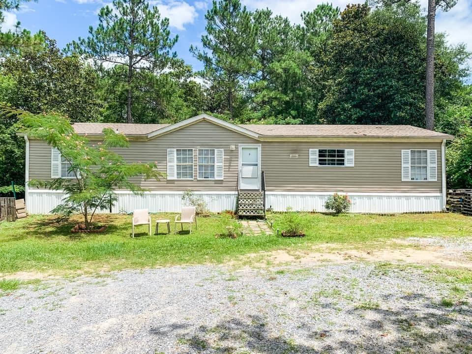 Three bedroom, two bathroom rental available for October 1st, 2021. There is a living room and den in this home. The spacious kitchen features ample cabinets and countertop space along with a dining room area attached. The property is set back off of the road on one acre has been very well maintained. Lease application is required along with a back ground check, credit check, proof of employment and references. The rental does not allow pets or smoking on premises.