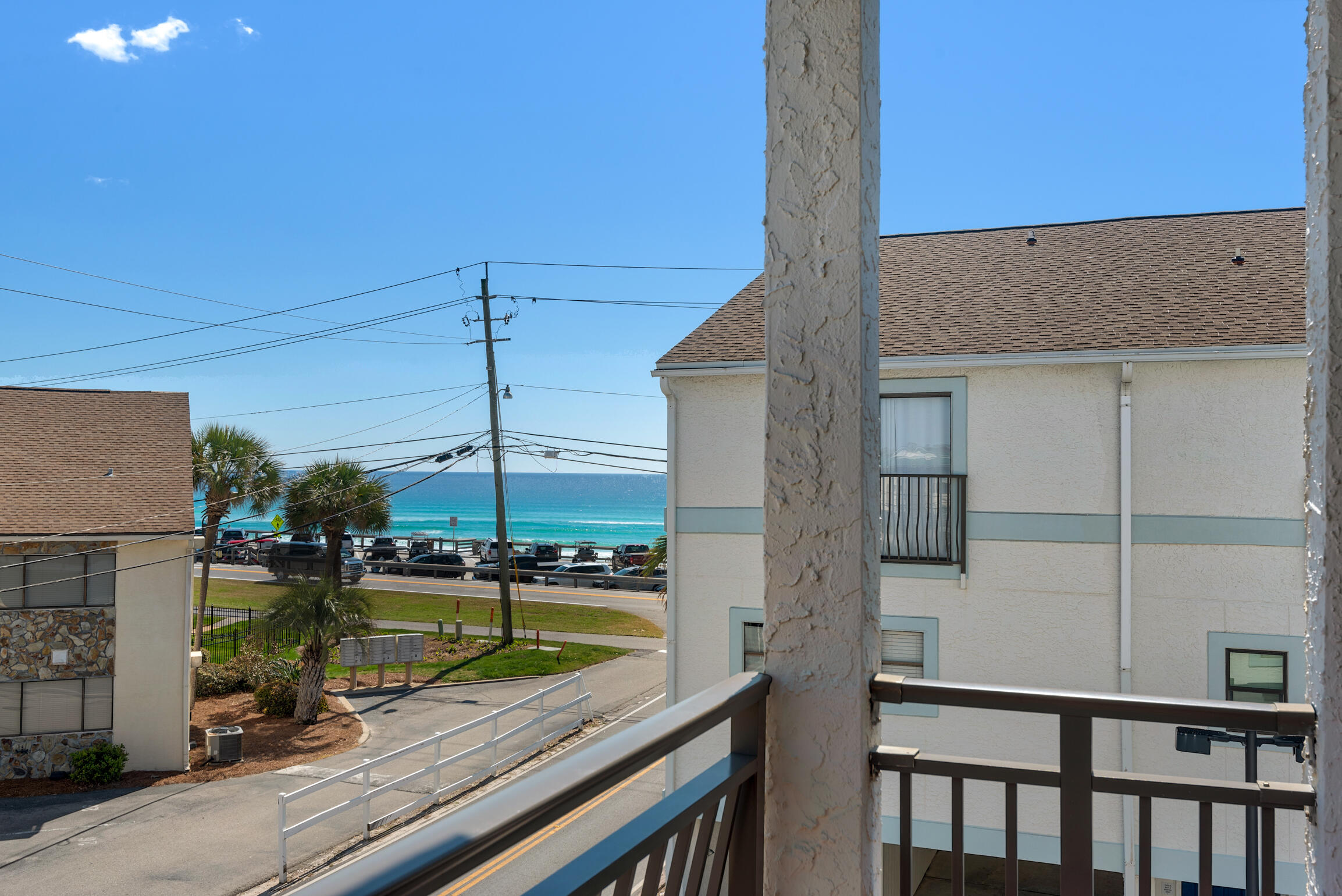 Purchase for only 10% Down! Turnkey Renovated Townhome • Low HOA • 2 Private Balconies • 2 Covered Parking Spaces - Welcome to Costa Vista #9, where coastal elegance meets unbeatable location! Just steps from the beach and directly across from the iconic Pompano Joe's on Scenic Gulf Drive, your DREAM location is here! This fully remodeled, turnkey townhome is the epitome of stylish seaside living, offering Gulf views, two private balconies, two covered parking spaces, and one of the lowest HOA fees in the area.
Spanning nearly 1450 sq feet of thoughtfully designed living space, this two-bedroom, 2.5-bath retreat has been completely updated with premium finishes and coastal-inspired décor. More... The fully renovated kitchen features gleaming granite countertops, storybook-white cabinetry, and sleek stainless steel appliances, ideal for preparing meals in style. Enjoy unobstructed Gulf views from your upper-level balcony, perfect for morning coffee or sunset cocktails. Take the wooden staircase up stairs and retreat to two spacious king suites, each offering its own private ensuite bathroom for ultimate comfort and privacy.

Throughout the home, you'll find chic wood-tile flooring, fresh designer paint, and upscale furnishings that create a refined coastal ambiance.
The spacious living area includes two sleeper sofas, making it easy to accommodate up to 8 guests comfortably.

Step outside to two private balconies - one with Gulf views and the other overlooking the community pool, offering the perfect blend of relaxation and scenery.

Enjoy the convenience of covered drive-through parking for two vehicles, a rare and valuable feature in the heart of Miramar Beach.

A full-size laundry room, half bath, and ample storage space add to the functionality and ease of this well-appointed home.

Take advantage of exclusive access to the community pool, and soak in the Florida sun just steps from your door.

Whether you're spending your day on the beach, dining gulf-front at Pompano Joe's, or exploring the nearby shops and entertainment in Miramar Beach and Destin, you'll be right in the heart of it all.

This stunning home is not only an exceptional personal retreat, but also a proven vacation rental favorite and a rare blend of location, luxury, and investment potential. Qualified buyers can purchase for only 10% down w/ local lender.