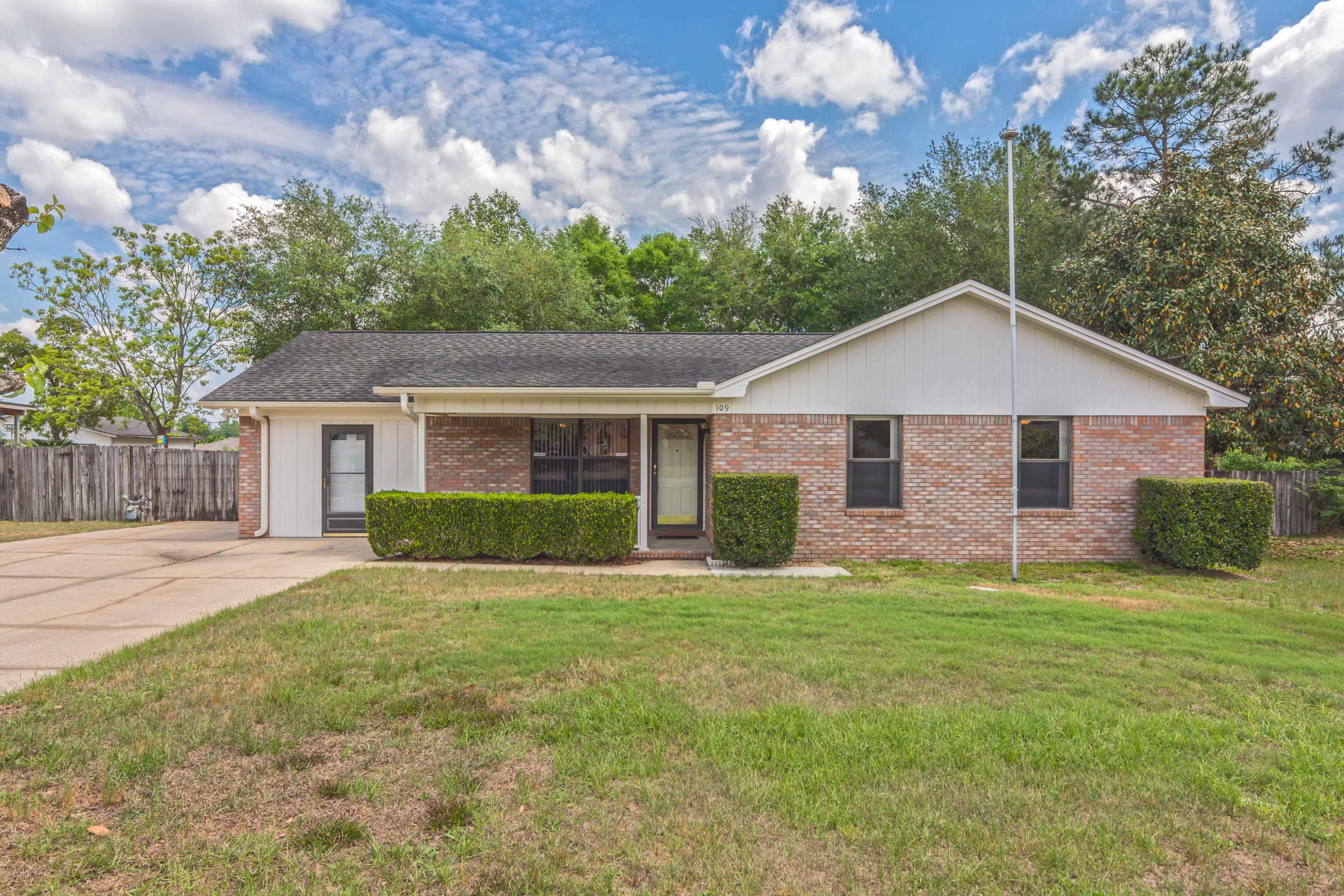 This pretty gem has many facets sure to please, set on close to half an acre SOUTH of I-10! (That's almost unheard of) Extra wide driveway leads up to lovely front porch, perfect for rockers & more! Come on in, notice the detail in the orange peel wall finish and knock down ceilings throughout (no popcorn!). Tiled eat-in kitchen offers an abundance of lovely maple cabinets, soft close drawers, solid surface counters and stainless steel appliances, along with an extra spacious pantry. All closets through out the home are equipped with Fast-track type shelving for efficiency of all space. From the kitchen you can access the garage/workshop with cabinets galore with a storm door access from the front and access to the back yard. The back yard features large-concrete finished areas for BBQ, tables & chairs and just about anything you would like! Huge 22 X 29 covered RV pad has electric hook up, great storage area for jet-ski's, boats (double gate on wheels for easy entry) or could even be a place for entertaining (shrimp boils w/friends).  To the back of the property is a huge workshop with electricity, 220 outlets for machinery, storage and more, behind fence is another shed for yard tools & storage.  Yard has irrigation system and house has Trane HVAC just to name a few of the many details that add to the thoughtful appeal of this pretty home.  Can't wait to show you this home, call us for an appt today!