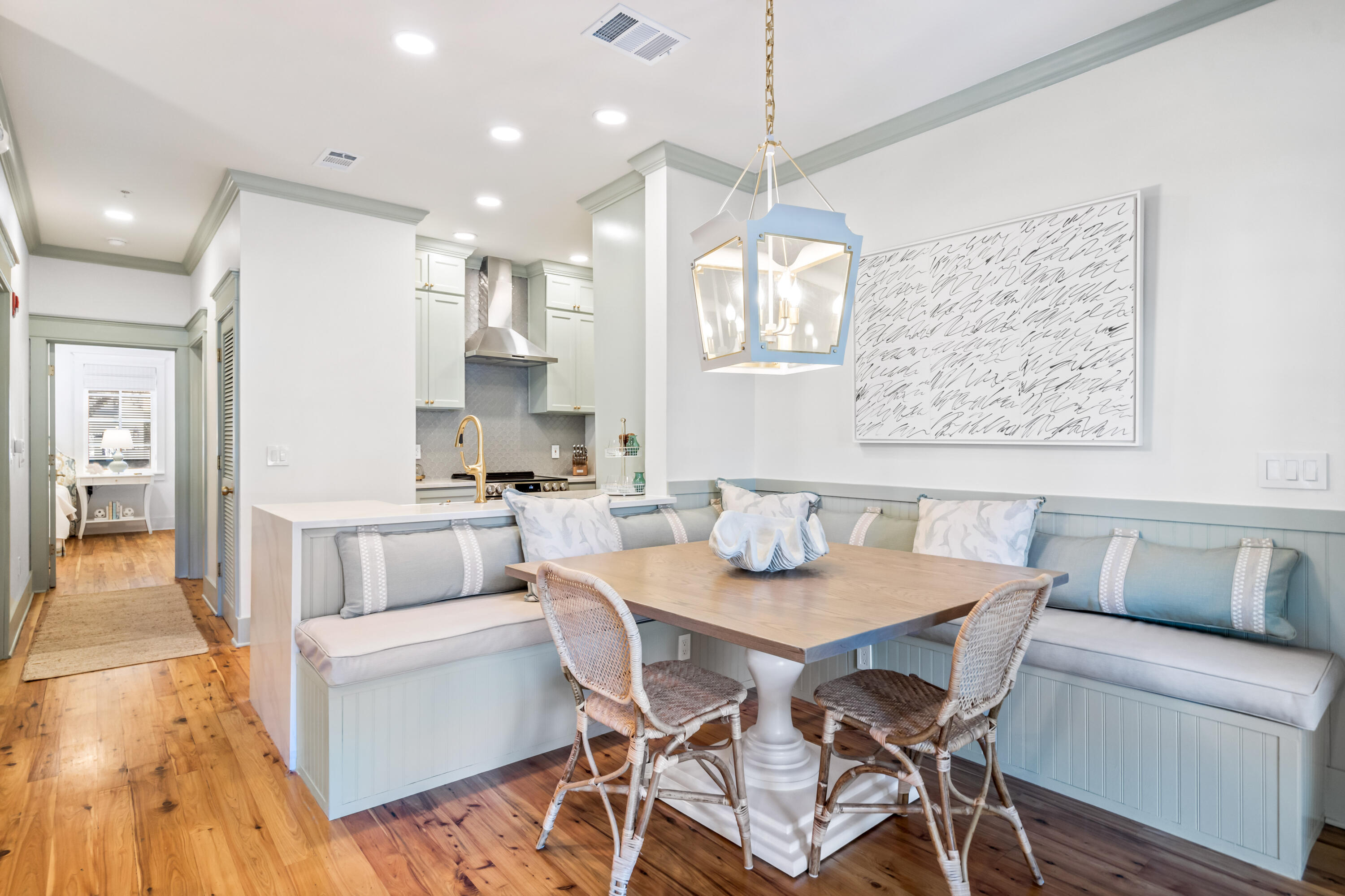 Welcome to your perfect retreat in Rosemary Beach! This stunning first-floor condo, thoughtfully designed by K. Lewis Interior Design, offers a seamless blend of sophistication and comfort. With its prime location across from the Splash Pad, St. Augustine Green, and near the Owners' Pool and Pavilion, you'll enjoy easy access to the best amenities this charming community has to offer.
Step inside and be embraced by the soft and calming palette of the sophisticated interiors. The living space features a large custom-built dining table and a corner banquette with soft cushioned seat backs, creating an inviting atmosphere for meals and relaxation. The kitchen counter serves as a convenient buffet area, perfect for entertaining guests. For the culinary enthusiasts, the kitchen is a dream come true, featuring a deep farmhouse sink, new stainless-steel appliances, and beautiful countertops providing ample workspace to create culinary delights. The full-size, large capacity washer and dryer make laundry a breeze, allowing you to focus on making the most of your vacation.
The living room is a cozy haven overlooking St. Augustine Park, furnished with a sleeper sofa, swivel club chairs, and a Smart TV that can be angled for your viewing pleasure. The guest bedroom is designed with comfort in mind, featuring built-in queen over queen bunks with pull-out drawers for added storage. 
The guest bathroom showcases a single vanity and a shower-bathtub combination, enclosed behind a frameless, classic roller-style sliding shower door. The arched ceiling and colorful subway tile add a touch of elegance to this space.
As you walk down the hallway, you'll find the spacious master bedroom, adorned with a king-sized bed, large dresser, gorgeous bedside tables and a Smart TV. The ensuite master bathroom offers a double vanity and an expansive walk-in shower with a seat and a petite Japanese soaking tub, enclosed by a wall of glass. The white and gray porcelain tile and gold faucets and hardware creates a peaceful and airy ambiance, ensuring a soothing retreat after a day of beach activities.
Outside, the gated porch provides a serene view of St Augustine Park, offering a perfect spot for outdoor dining and relaxation. Everything was thought of, from the rain gutters to keep you dry to the powerful internet to keep you connected. Whether it's sipping morning coffee or enjoying peaceful evenings, this space sets the stage for unforgettable moments.
This condo in The Flats of Rosemary Beach is a rare gem, offering comfort, style, and convenience in one delightful package. Don't miss this opportunity to make this beautiful property your own. Schedule a showing today and experience the quintessential coastal lifestyle!
Information in this listing is believed to be correct, but please verify any information that is important to you.