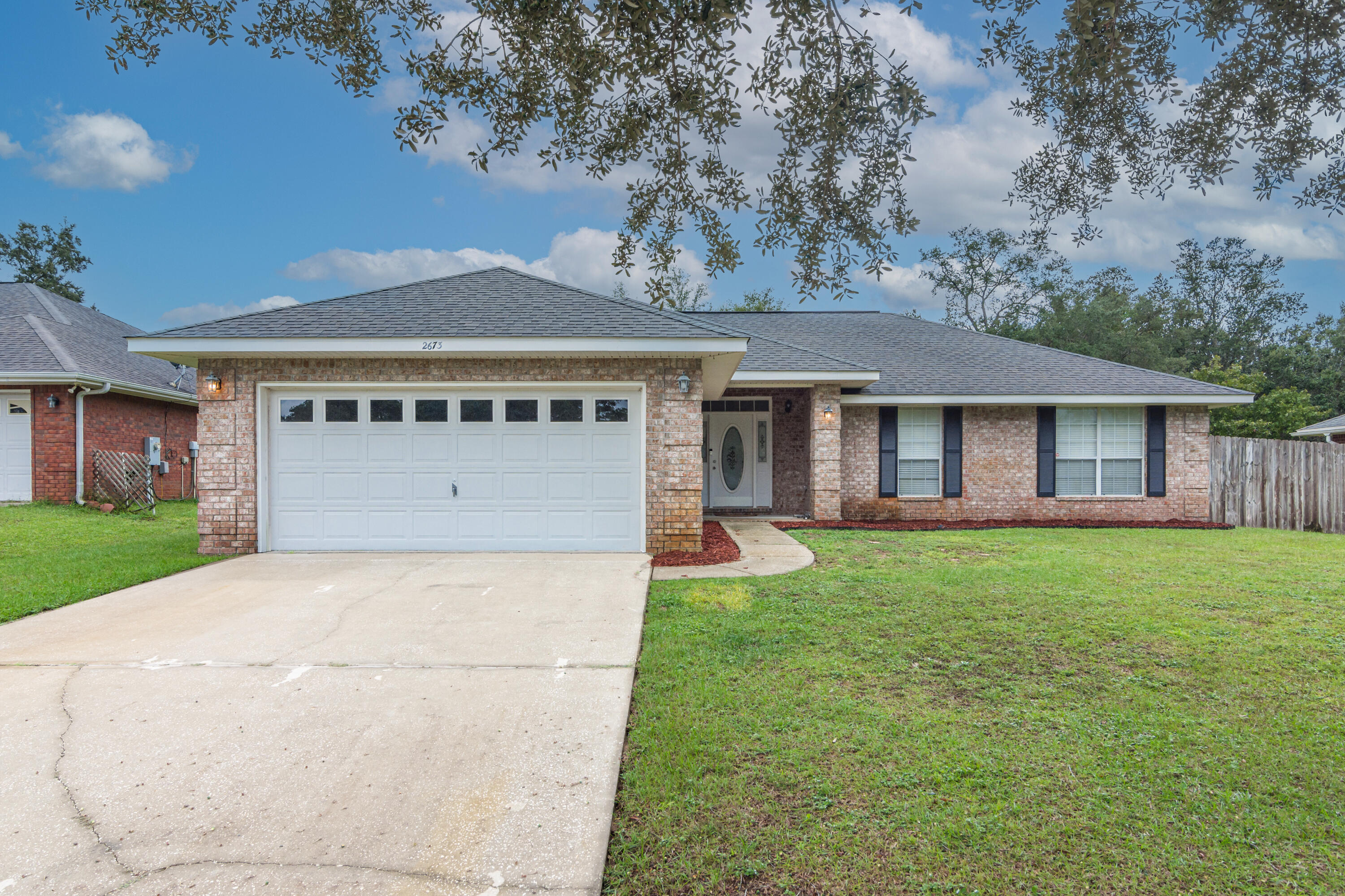 Fantastic location at the end of a cul de sac. Enter this brick home and enjoy the open floor plant! Great wood laminate flooring throughout the main areas and upgrades throughout will make this one to put on your wish list! The kitchen features stainless steel appliances,, breakfast bar, and overlooks the large living room. Four spacious bedrooms all have great closet space and they are located in a split floor plan for privacy and convenience. Master bathroom  features double vanities , separate garden tub, walk in shower, and closet. There is an indoor laundry room, fenced in backyard, and a two car garage.