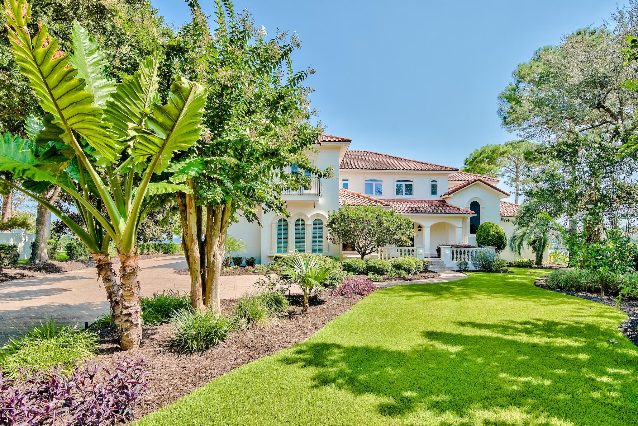 Breathtaking views surround you in this exquisite waterfront home at the mouth of Jones Bayou with expansive views of the Bay & Bayou and 186' of water frontage, the dock and boat lift are new with the addition of lighting, two 50 Amp electrical outlets and water. This lot is by far one of the best in Kelly Plantation!
The home has been Completely  remodeled and upgraded from top to bottom with the addition of an additional bedroom, a full bath, second family room and a large pool with screened lanai that over looks the bayou and the bay. The Chef's kitchen and first floor family room have been opened to offer an expansive first floor with water views from every room. The master suite is located on the first floor with a large ensuite bathroom with dual vanities, new cabinets, leathered granite counter tops, a large walk-in shower with two nice size walk-in closets.  There are two half baths on the first floor, one that opens to the screened lanai and pool area. New lush tropical landscaping, a large covered front patio with new tile flooring and beautiful triple mahogany front doors that greet you when entering the home. The drive way is pavered with plenty of room for parking in addition to the oversized three car garage. 
All New Paint Exterior and Interior, new carpet in all of the bedrooms, beautiful travertine flooring, all new appliances with a large professional refrigerator, six burner gas Thermador cook top and custom hood. The fireplace and kitchen back splash feature mother of pearl tile that is beautiful, all of the counter tops have been updated with quartz and granite, all new lighting through out the home.  The list of upgrades is extensive, make plans to see this waterfront home in the prestigious gated community of Kelly Plantation today!

All room dimensions, square footage and pertinent information to be verified by the Buyer.