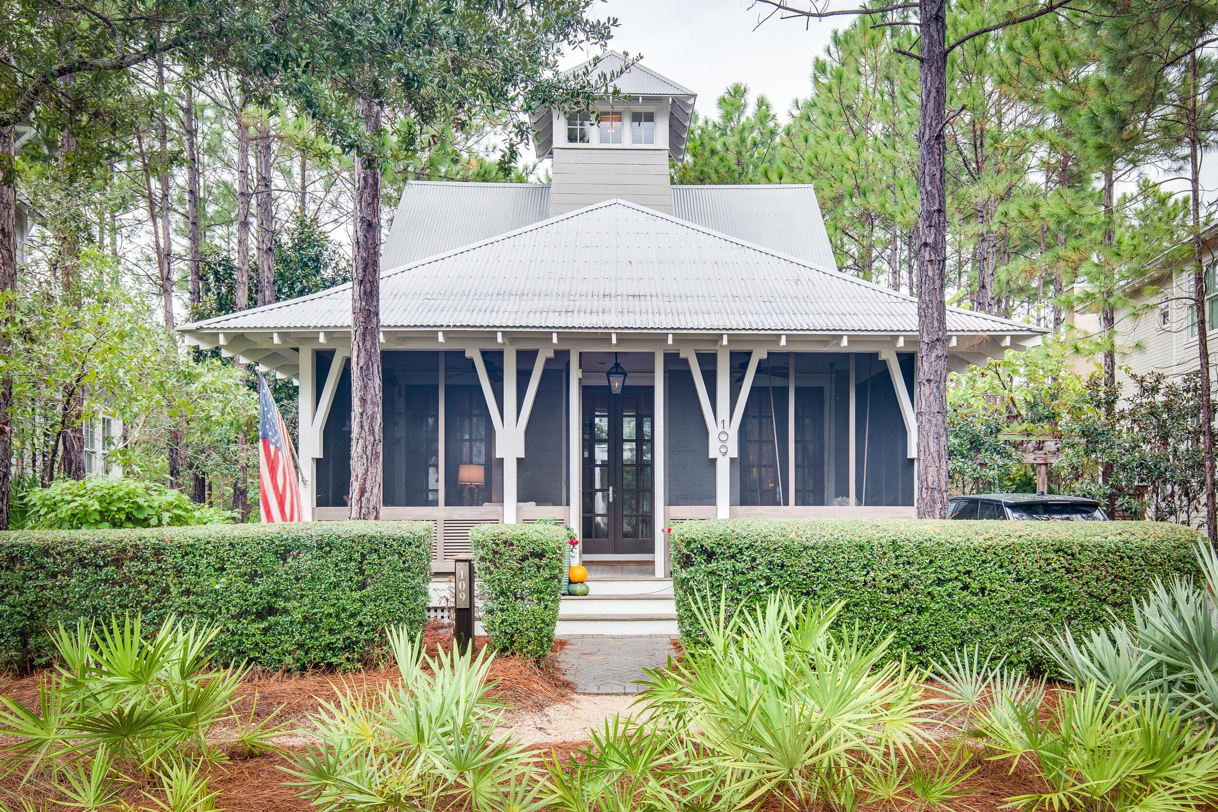 Charming beach cottage in the much sought after Sandy Creek section of Watercolor.  Interior Designer Cindy McCord from Memphis added her signature touches to this wonderful home. This home sits on a large lot with plenty of room to add a pool or carriage house.  The master bedroom, living, dining and kitchen are all located on the first floor which makes this an extremely functional primary or secondary home.  
Some of the coveted features on the first floor include a cozy screened-in front porch, stunning quartz kitchen island and multiple areas for storage.  The master bedroom has walk in closets, a quaint sitting area and a spacious master bath with separate walk in shower.  Upstairs you will find two more bedrooms and each has its own private bath with shower and tub. This home also has a tower room which provides additional space for storage or anything else you see fit.  Step outside and find a great outdoor space with a paved barbecue and dining area, a fountain and an arbor built for hanging plants. There is ample parking for 3 cars. You will be just a short walk or bike ride to all the Watercolor amenities and beach of course.  This home has never been rented and is a must see! It is in a quiet location of Watercolor. Enjoy all that this location has to offer including all of the amenities of Western Lake, multiple community pools, tennis courts, Beach Club at Watercolor, shopping, restaurants and more!
Room dimensions should be verified by buyer.