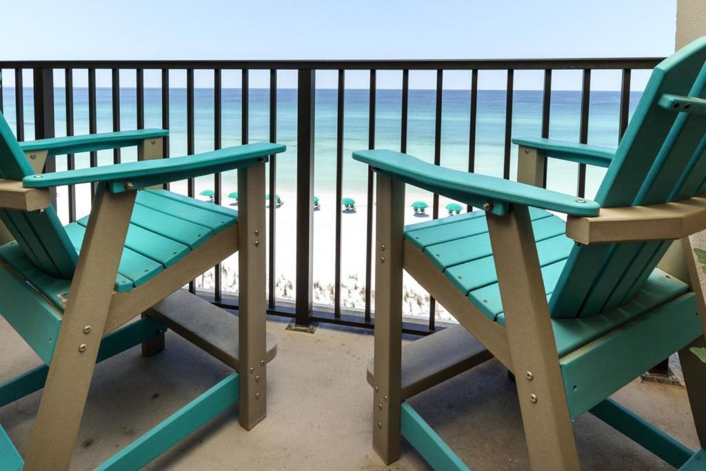 New to the market: Emerald Tower West unit 5002 is a true beach front paradise! Emerald Tower West has only 44 units making it a true retreat from the hustle and bustle of every day demands. This 3 bedroom 3 bath, spacious fifth floor unit, is designed to give you a full wall of Gulf views of the Emerald Coast. 

The living room/ dining room/ and kitchen flow spaciously for families to gather, relax and take in the fabulous views. The living room is spacious to include a queen sized sleeper sofa, comfortable accent chairs, a TV, and a fireplace console with a for the chilly evenings after a walk on the beach. 

The master ensuite bedroom features a handmade king size headboard and bed from which you have expansive views of the Gulf. 
 There is a door to your own private balcony. In this suite are ceiling to floor white blackout curtains, a fireplace console and handmade art that cover the electrical cords for the TV hanging on the wall and a full chest of drawers plus a swivel chair. 

The third bedroom with its ensuite bathroom, and king size bed could also be a master bedroom if so desired. It has a fireplace console and a good size TV with chest and end tables on either side of the king size bed.

The middle bedroom features twin beds, a chest of drawers with a TV on top plus a leather chair. This bedroom also has private access into the guest bathroom. 

The kitchen has granite countertops a new microwave, new stove/oven, new refrigerator, and new W/D. Bonus! a massive owners closet in the hallway to store your personal items.

The condo has been fully renovated with LVP flooring throughout, updated paint, new kitchen appliances, new washer/dryer, new front door, entry keypad, and doorbell. Additionally, it has all new furniture including unique "ghost" chairs for more seating at the table and the counter. You can comfortably seat six at the table and any overflow can sit at the counter to be part of the party.

I hope you enjoy this home as much as the current owner has. It has been proven to be a wonderful rental property and many return from year to year. See Documents tab for impressive Rental History!