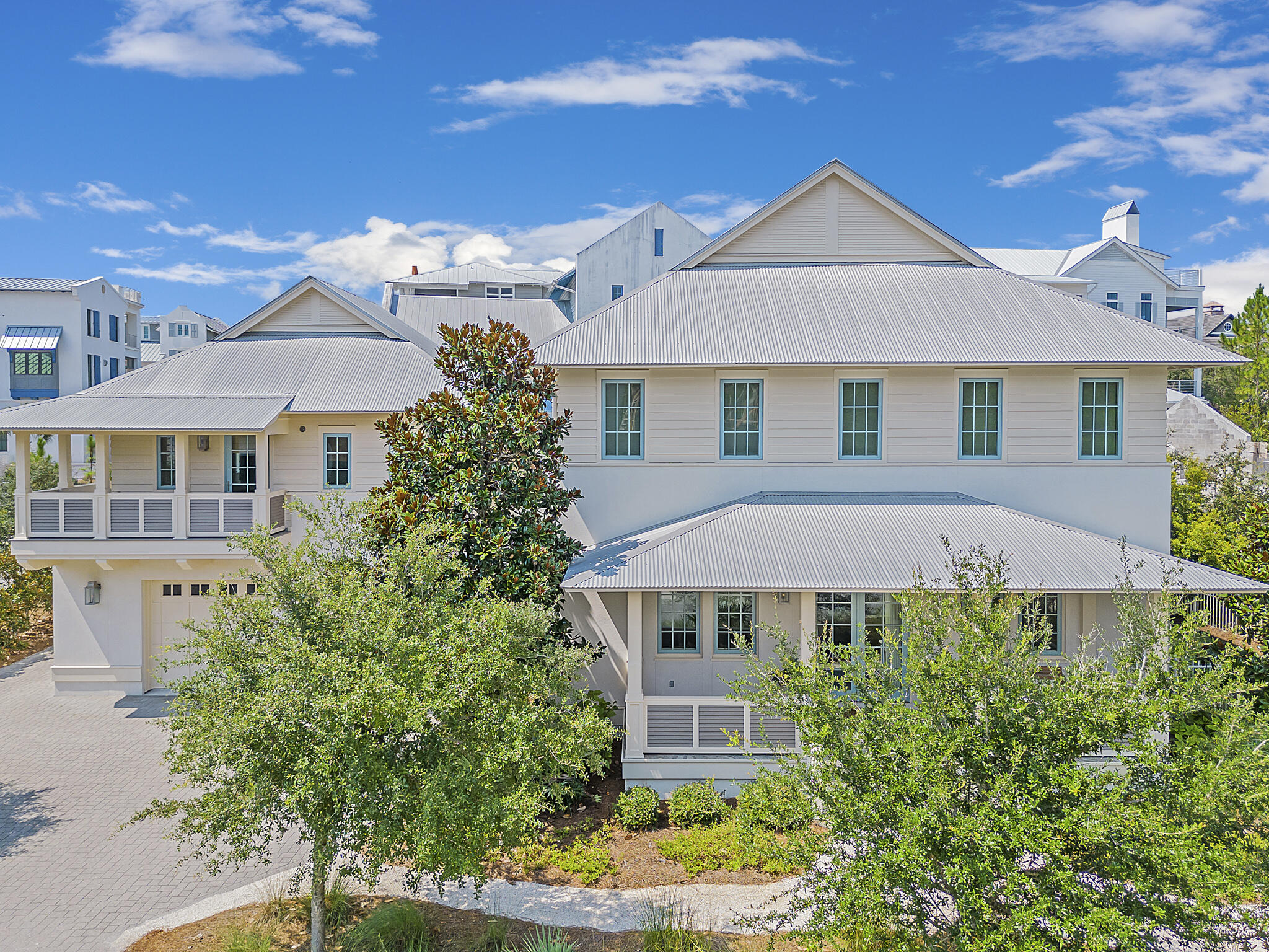 Welcome to 42 East Bermuda located in the most private and coveted community along the Gulf Coast; The Retreat. This beautiful home sits a few steps from one of the most expansive private beaches in the area. The home is in immaculate condition! The wide front porch invites you into a light filled living area complete with built in shelving that is perfect for showcasing pieces of art. Just off the living area is a 5th bedroom currently being utilized as an in home office.  To the rear of the home is the open kitchen and dining area. The well appointed kitchen has top of the line appliances satisfying any chef's needs. French doors open up onto the screened porch running the width of the home and featuring a sitting area situated around a gas fireplace. Just off the porch is the oversized pool and pool deck. The pool is the perfect oasis from the heat. The fenced in yard is great privacy for kids and pets. Back inside you find the first floor master suite. The suite has dual walk in closets, private access to the porch and a large bathroom complete with a garden tub and shower.  The laundry room and half bathroom round out the main floor of this home. The second level functions as another living floor with a large sitting area and an oversized covered porch.  The porch has ample room for lounging or ping pong in an outdoor yet protected space.  Two guest bedrooms complete this level; both with en suite bathrooms and walk in closets. 

The detached carriage house functions as independent living quarters. The porch opens up into an open living and dining area complete with a kitchenette. A private bedroom and bathroom are located off the living area. Hallway bunks provide additional sleeping accommodations making this guest house ideal for visiting friends and families.     

Finally the oversized 2 car garage provides more than enough storage for cars and all the beach toys making this home one you can comfortably settle into.  

The brand new Gulf front private beach club features a huge pool situated high atop the dunes with sweeping views of the beach and Gulf. This amenity is only available to those in The Retreat. The Retreat does not allow vacation rentals thus ensuring it continues to be a quiet enclave amidst the popular 30A area. The gates ensure solitude and privacy, but just outside the community you find numerous restaurants, a local bakery and a health foods market.  

All of these features are difficult to find this close to the renowned white sandy beaches of Walton County, Florida.  If you throw in the fact that this home is located in The Retreat, the most private community on the Gulf Coast, then you truly have a special place.