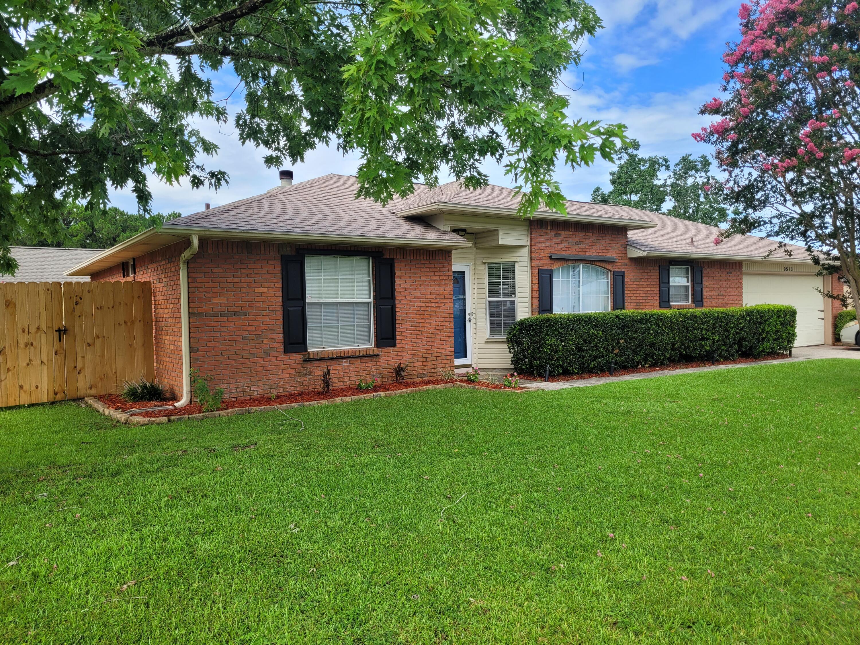 This all-brick home is 8 miles west of Hurlburt and 3.5 miles east of Navarre Beach bridge. The large master bedroom features a walk-in closet and a master bath with cultured marble double vanities and a tile floor. The open kitchen boasts Corian countertops, a seamless sink, plenty of wood cabinets, a pantry, and a Corian-topped island. Stained oak cabinets adorn the kitchen and bathrooms. The formal dining room adjoins the kitchen and overlooks the great room with a vaulted ceiling and brick fireplace. Large corner lot wih fenced yard and firepit. Easy access for a large boat or storage in the backyard. 
One year lease, no pets, no smoking, clean credit (minimum 700 FICO credit score) good and verifiable rental and employment history. Rent reflects discount if paid by first of each mth