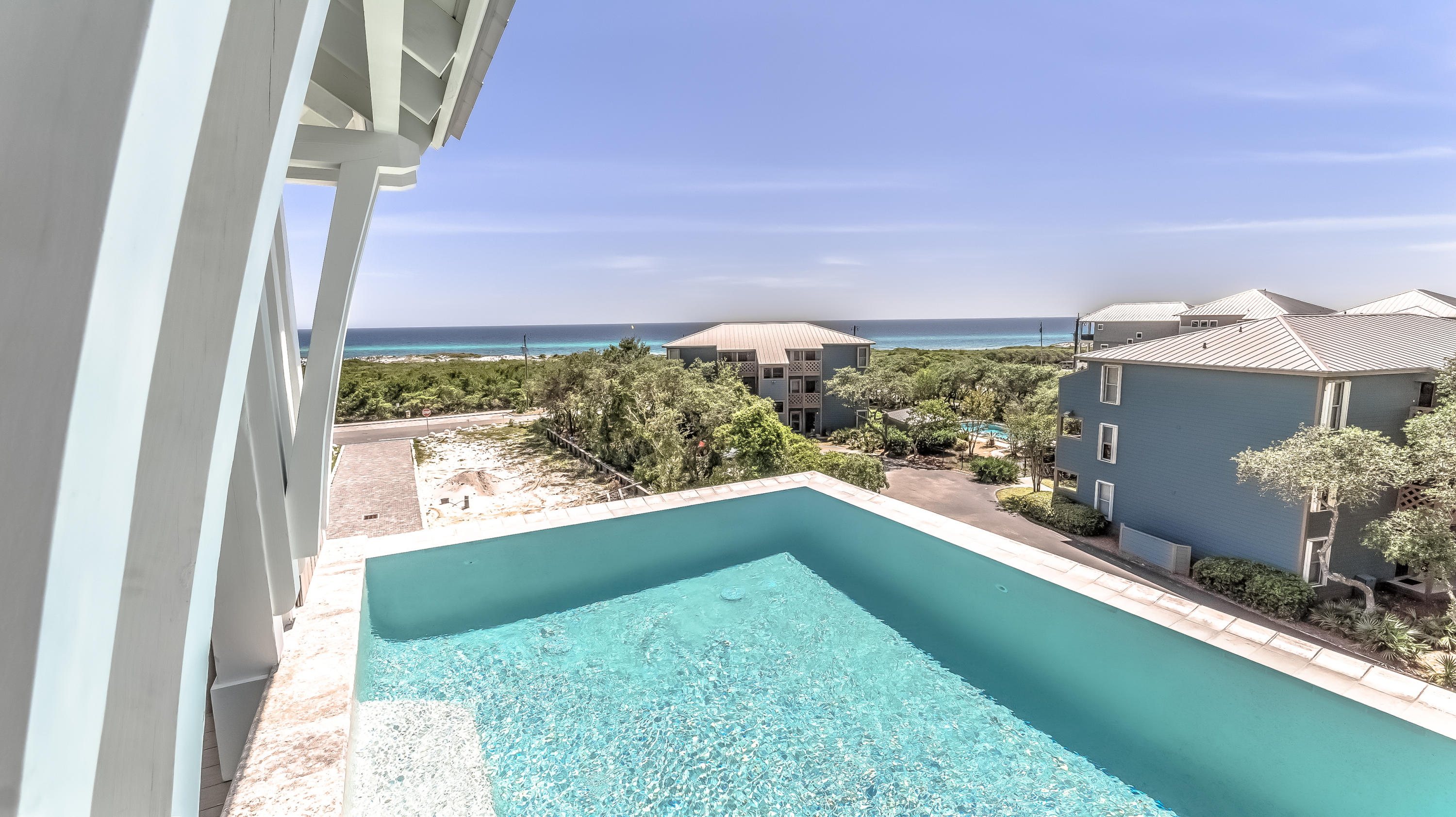 Spectacular new-construction home with breathtaking forever views of the Gulf of Mexico.
This home is the 1st of 7 total that will make up Mala Beach, one of Inlet Beach's newest premier gulf-side neighborhoods.
Situated just steps from Walton County's largest beach access, you can walk out your front door and have your toes in the sand in less than 3 minutes.
Enter the home through the front door and you're met with dramatic 14-ft ceilings and beautiful shiplap covered walls. The downstairs consists of 2 bedrooms, one that's been purposed as a bunk room with unique loft-style beds for the kids, and the other a downstairs master suite with attached full bath.
Luxurious finishes including a wet bar with built-in wine cooler and an elevator that services all 3 levels. See Mo Luxurious finishes around every corner including a wet bar with built-in wine cooler and an elevator that services all 3 floors. 

1st floor also includes an additional full bath and a common living area, making it the perfect gathering place for family and friends. 

As you continue on to the 2nd floor, there are 3 total bedrooms, one with ensuite bath and the other 2 connected with a full jack-and-jill style bath. 

Also on the 2nd floor is a wonderful outdoor veranda with captivating views of the gulf, and offering the perfect space for relaxing with your morning coffee or evening cocktails. 

This floor also includes the laundry area, which has been thoughtfully positioned central to all 3 bedrooms and is enclosed with a magnificent custom-built sliding barn door. 

As you continue on to the the 3rd floor, you'll notice a wonderfully open space consisting of the kitchen, dining, and living areas. 

Kitchen has all high-end stainless steel appliances including a built-in ice-maker and additional wine cooler, and accented with beautiful custom cabinetry and quartz countertops. 

Ceilings are vaulted in the living room, adding to the open and spacious feel, and abundant natural light floods in from the floor-to-ceiling glass doors and fills the rooms.  

Slide open the doors and step outside onto your very own private oasis. A large and expansive deck with 3rd floor heated pool is truly extraordinary, and creates the optimal space for entertaining guests, splashing with the kids in the pool, and experiencing every sunrise and sunset.

Another notable feature is the garage, which provides tremendous additional storage space with enough room to park a car, golf cart, or to store your beach gear. 

If you're considering this property as an investment, the opportunity is excellent. Annual rental projections are estimated at $181,000/yr, offering nearly a 10% return on investment. 

For even more added appeal, this home is in a superb location, just a 5-minute bike ride to the shops, restaurants, and attractions of nearby Rosemary Beach, The Shops of Inlet Beach, and 30Avenue. 

Built by CYAN Builders 

This property is truly a must see and is ready immediately to begin generating substantial rental income. Give us a call today to schedule your private showing.