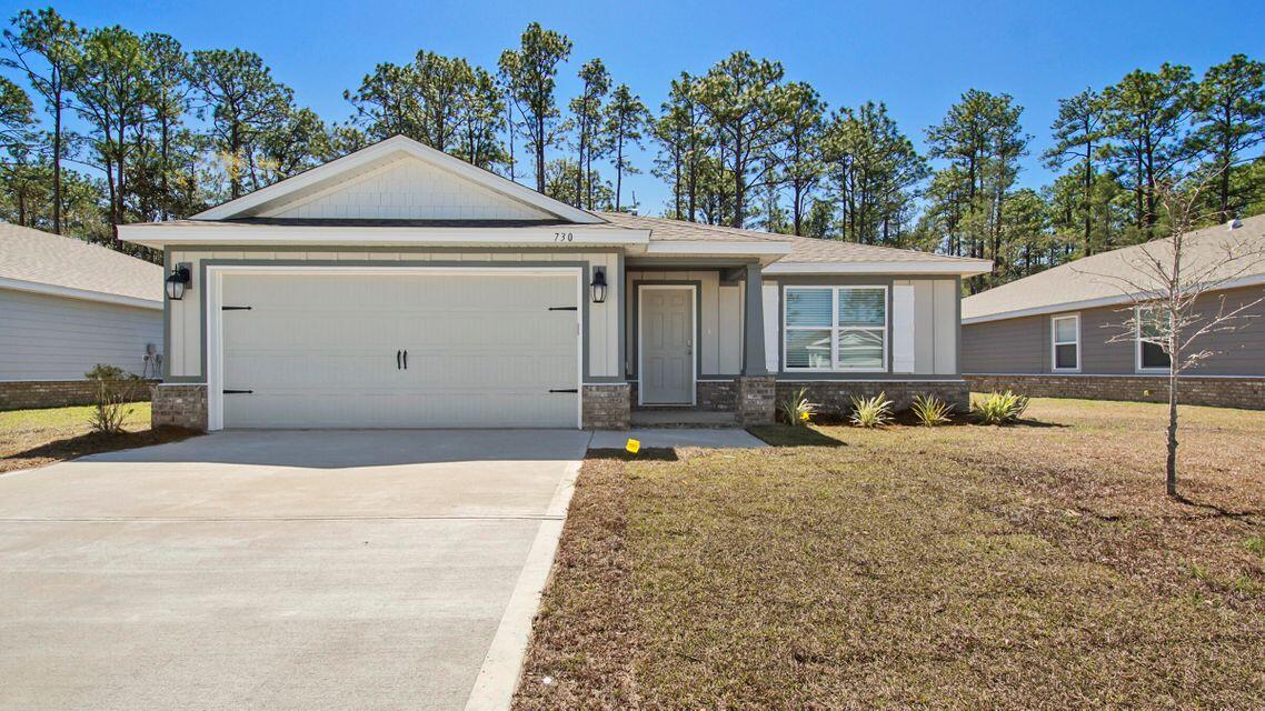 Welcome to this beautiful 4 bedroom, 2 bath home in Freeport's newest neighborhood Riverwalk! Plenty of space with 1769SQFT with 2 car garage. Master bedroom features a walk in closet and spacious bathroom with double vanity. Home is complete with stainless appliances, granite countertops, laminate and carpeted flooring and a nice sliding glass door to the wooded view back patio! Community clubhouse, pool and amphitheater are under construction. Community dock with access to Lagrange Bayou. Only 12 mile drive to the beach!
