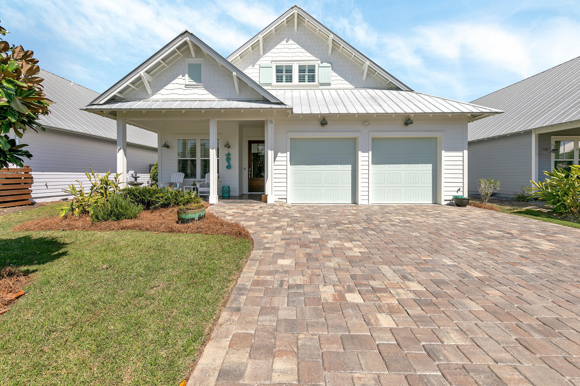 Picture yourself living near the beach, restaurants and shopping in this beautiful home with NO HOA fee.  Located less than 1/2 mile to the beach this home is truly made for the beach lifestyle.  Beautiful Heart Pine floors welcome you throughout the main living area with carpet in the bedrooms.  The open, split bedroom floor plan is a favorite of many buyers with lots of room for entertaining.  Wood cottage cased windows and 2-piece crown molding accent the high ceilings.  Main living, master and two additional bedrooms located on the main floor with a versatile bonus 4th bedroom/office/playroom/you name it located upstairs.  This room is plumbed a future bathroom.  Kitchen features stainless appliances and gas range.  Master bedroom, located in the rear of the house features two walk-in closets and access to the screened porch.  Private bath with double vanity, walk-in shower with built in seat, as well as a water closet.  Slide open the 3 panel sliding doors that open to your screened porch and head on out to sunbath or take a dip in the pool.  The expansive professionally landscaped (fenced) backyard offers ample room for playing ball or relaxing in the garden.  Whether you are looking for your full-time or 2nd home you won't want to miss this one.
