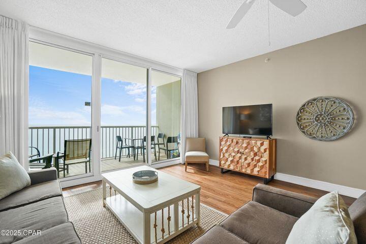 The beach getaway you have always dreamed of - a beach inspired 2BD/2BA Gulf front condo at Majestic Beach Towers. Gorgeous Riveting Gulf views are framed by beachy chic interiors, designed with the Gulf of Mexico and sun in mind. Sunshine and warm gulf breezes abound from the generous balcony, with amazing water and beach views. This fresh, ultra clean, meticulously maintained, turnkey offering has all of the extras and will convey fully furnished, decorated, and rental ready. Contact listing agent for detailed rental report. Luxury vinyl plank throughout.