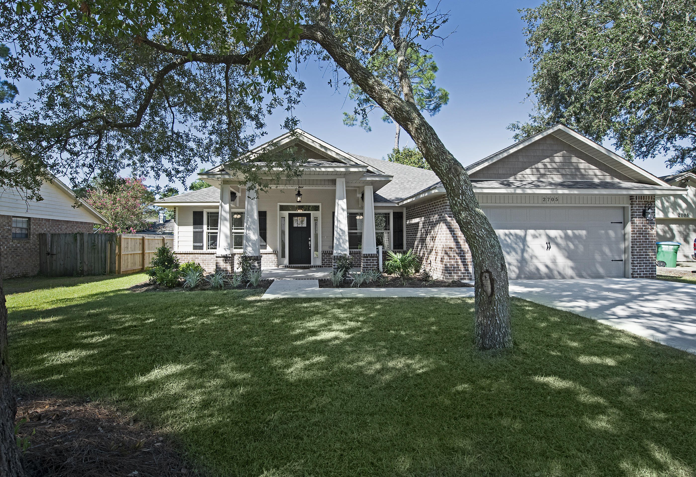 This is an all brick 5 Bedroom, 3 full Baths, 2236 square foot home in Sandpiper Village. This split floor plan home features a spacious great room, formal dining room and a large kitchen with granite counter tops, stainless appliances, smooth top stove, and a built-in microwave and dishwasher. The home has tile floors in the Great room, all wet areas, hardwood floors in the formal dining room and carpeting all bedrooms. The Master Suite features: a large tiled shower, jetted garden tub, double granite vanity, tile floors and a large walk-in closet. There is a 11x17 covered porch on the back of this home. Landscaping: fully-sodded, in-ground sprinkler system with well.
