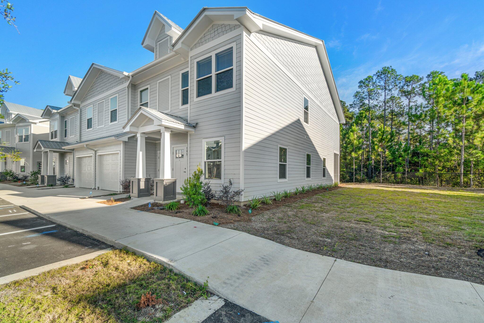 Experience the tranquil, relaxed lifestyle with the luxury of the beautiful white sandy beaches just down the road. You won't want to miss out on this opportunity! Covered, screened in back porch area, quartz counter tops, LVP flooring throughout, all stainless appliances, mini blind window coverings, community pool, 3 beds / 2.5 baths.