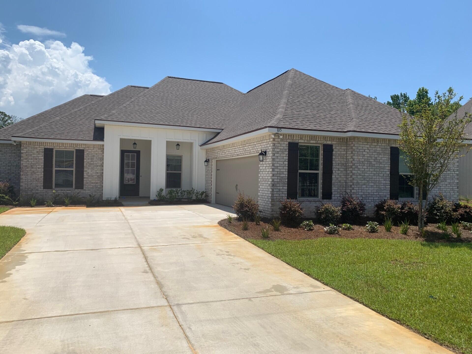 The KLEIN III G in Wildflower at Hammock Bay community offers a 4 bedroom, 3 full bathroom, open design. Upgrades added (list attached).  
Features: double vanity, garden tub, separate custom tiled shower with frameless door, and walk-in closet (continues to laundry) in the master suite, tray ceiling in master bedroom, double vanity in second bathroom, kitchen island, walk-in pantry, covered front and rear porches, boot bench in mudroom, crown molding, recessed lighting, framed mirrors, smart connect Wi-Fi thermostat, smoke and carbon monoxide detectors,  landscaping package, architectural 30-year shingles, flood lights, and more!
Energy Efficient Features: water heater, kitchen appliance package with electric range, vinyl low E windows, and more!