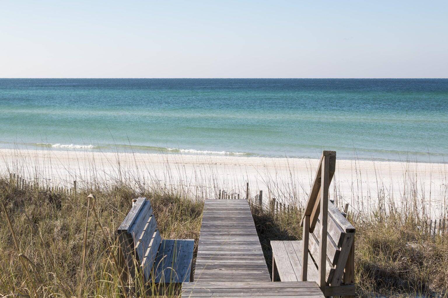 Under contract w 72 hour kick out.  Simply stunning!!...As is the view of the glistening gulf right outside your door! This compactly sized beachfront retreat is all you could ever want, or truthfully, ever need. Newly constructed by the acclaimed builder, Benecki Homes of Atlanta and sumptuously decorated by the talented Melanie Turner Interiors Atlanta, this 800+ square foot cottage might make you fall in love all over again. Approach the entrance via a magnificent view of the sugar white sand and emerald green waters of the gulf and follow the steps up to an expanse of deck that spans the cottage. Enter elegant eight foot French style doors and step into jaw-dropping beauty and sophistication. Try and catch your breath as you take in the numerous, tasteful elements that surround you. Take note of the lovely wire-brushedwashed oak floor; the vaulted, bleached cypress ceiling; and the silky smooth Venetian plaster walls. Along one wall is the kitchen, with it's handsome, weathered grain Leicht cabinetry, which is graced by a gorgeous marble countertop. Cleverly clad to blend into the cabinetry is a full sized Liebherr refrigerator and a compact Bosch dishwasher. A delightfully sized Blue Star dual fuel range completes the top of the line appliances and is topped by a stainless vent hood. The furnishings of the main living area, and throughout the home are so incredibly, beautifully selected. An oval Saarinen dining table is the showplace for an awesome, over-sized arrangement of succulents, and a hefty expanse of rope suspends a chandelier of mammoth jingle shells. A fluffy Tibetan lamb rug anchors the elegantly upholstered linen sofa, woven side chair, and twin slab cross-sections of natural wood coffee tables. Leaving the main room, follow the hallway to the bedroom, and tucked neatly behind Venetian plaster doors is a laundry nook, replete with commercial grade stacked Whirpool washer and dryer and ample storage. Adjacent is an elegant half bath with Restoration Hardware marble topped vanity and a Waterworks faucet. In the master bedroom and bath you find that the superlative finishes and decor continue. The bedroom is a haven of tranquility, perfectly suited for blissful relaxation, and the bath is luxuriously appointed with a Carrara marble herringbone patterned shower, and marble topped RH double vanity with Waterworks faucets. There are generous walk-in closets located off both the master bath and bedroom. Graceful floor to ceiling window coverings are in place throughout the home, and all doors and hardware are quality crafted. There is very little left to want in this spectacular oasis by the sea. Come and discover for yourself how simply stunning your life at the beach might be... Information contained within this listing such as square footage, is deemed to be accurate but is not guaranteed. Buyer to verify