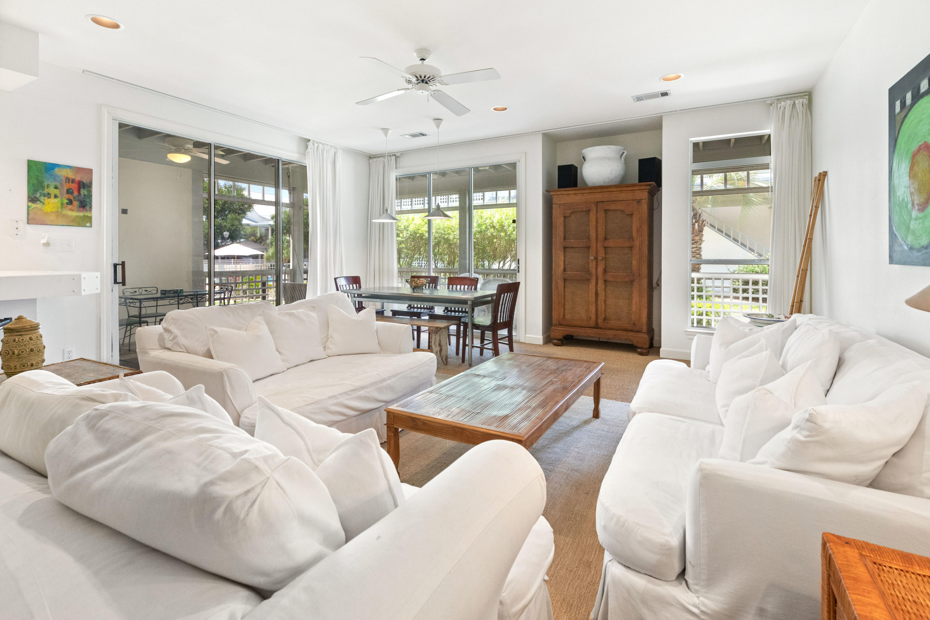 Quaint first floor Villa inside the guard gated resort of Hidden Dunes. Single level living with three bedrooms, three full bathrooms, a chef's kitchen with gas cooking, and a huge wrap around screened-in porch for year round outdoor living. This end unit condo has ample natural light and crisp coastal decor. Attached covered carport parking plus room for additional cars in the driveway. The Villas have their own private pool that is heated in the winter months. Beach lovers and Tennis lovers rejoice as this resort truly has it all: Deeded private beach access, six championship Rubico tennis courts, professionally staffed tennis center hosting seasonal activities, guard gated with 24-hour security, lighted basketball court, natural gas grills, and complimentary seasonal tram service.