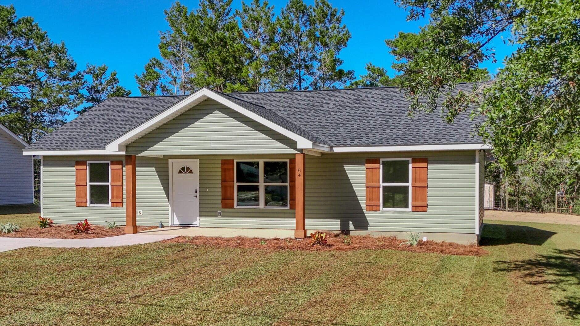 Construction is complete on this beautifully crafted, brand-new 3BR/2BA home, built with top-quality construction and modern design. The open-concept layout features vaulted ceilings, LVP flooring in main areas, white shaker cabinets, quartz countertops, and stainless-steel appliances, including the refrigerator! Enjoy relaxing or entertaining on the back patio, overlooking a spacious yard.

Ideally situated in DeFuniak Springs, this home offers an easy commute to South Walton, Crestview, Eglin AFB, and Hurlburt Field, with schools and parks just minutes away. Don't miss this move-in ready new build!

Seller offering $5,000 toward Buyer's Closing Costs with an acceptable offer!