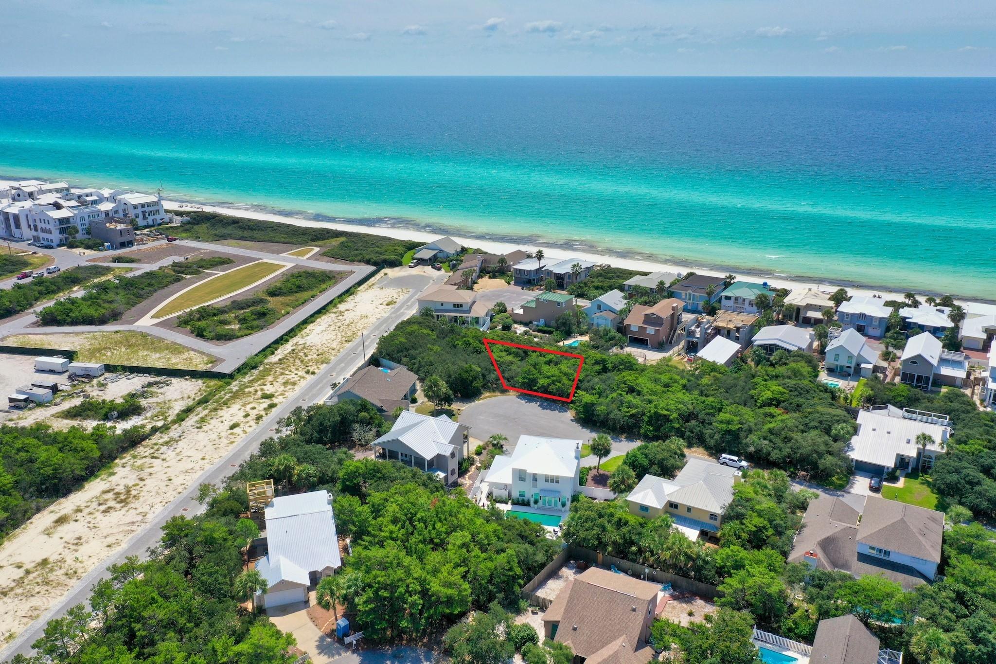 Amazing cul-de-sac lot in a private, non-rental gated Gulf front community of 30A. Sand Cliffs on the Gulf is an exclusive community bordering Alys Beach and the beautiful Gulf of Mexico. With low HOA fees and no build out time, this is the perfect opportunity to build your dream beach home! Gulf front lots are restricted from building higher than 18.5 ft, however Lot 12 can build up to 30 ft high which means you can still enjoy Gulf views from a higher floor! This large lot sits high and dry on the bluff, the perfect place to build your 2.5 story dream beach home with Gulf views & lush surroundings! Sand Cliffs features two deeded beach accesses offering 1300+ ft of pristine beach along the beautiful emerald green & crystal blue waters of the Gulf of Mexico. This is a prime lot location! You will be within 1/2 a mile of the beautiful white sand beaches and there is a walkway located on the same street just steps outside of your door that leads to the private beach boardwalk. Sand Cliffs on the Gulf offers a peaceful setting for private homeowners, with no thru traffic nor crowded beaches. Sand Cliffs is one of the highest elevations on the Gulf of Mexico along Scenic Hwy 30A. Lot 12 sits high on the bluff with miles of panoramic views, both west and east. Being south of 30A and nearby Alys and Rosemary Beach means you are just a short walk or bike ride away from all the attractions that the desired east end of 30A has to offer, yet you can relax and enjoy the privacy of being tucked away in a serene, non-rental, beachfront community. You are also very close to The Hub 30A which offers world class live music, family friendly movie night, sports on the big screen outdoors and great dining, galleries and shopping. Sand Cliffs on the Gulf is located amid Florida's finest beach communities, restaurants and recreational activities, so do not miss out on this incredible opportunity to have quick access to it all. Build your private oasis today!