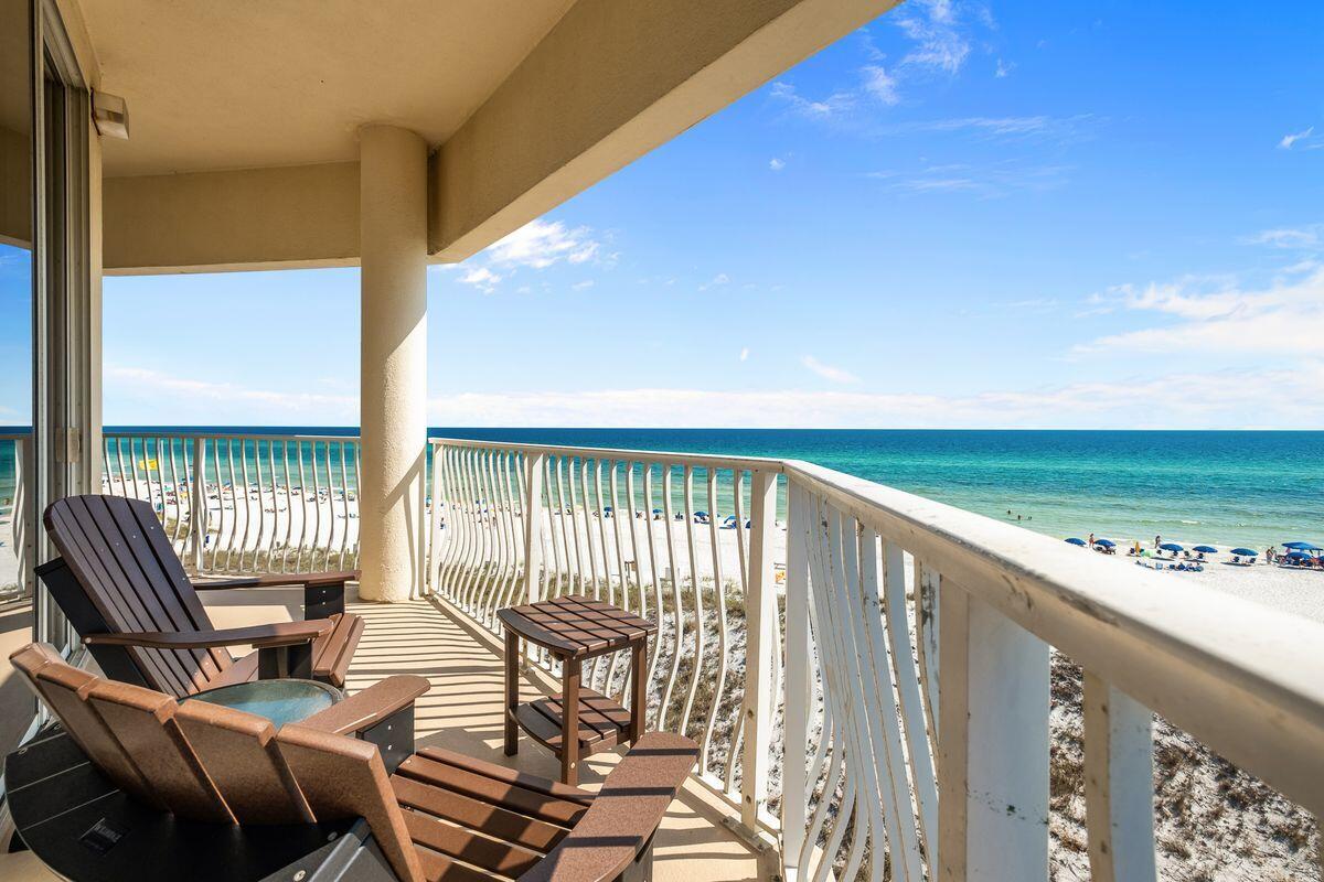 Tucked away south of 30A in desirable Seagrove Beach, this rare three bedroom gulf-front condo offers sweeping gulf views from every angle and just under 1,900 square feet of living space. Perched on the top floor of Dunes of Seagrove, this one-of-a-kind retreat boasts gulf views and balcony access from all three bedrooms. The expansive balcony wraps around the entire condo and is perfect for entertaining and taking in views of the Emerald Coast. Upon entering the foyer, you are almost instantly greeted with views from both the kitchen and living area. The fully equipped kitchen features granite countertops and stainless steel appliances. Eastern views can be enjoyed from the spacious master suite, which flows seamlessly to the ensuite with double vanities, a whirlpool tub and separate walk-in shower. Both spare bedrooms have private bathrooms, gulf views and exclusive balcony access. Dunes of Seagrove is one of few condo complexes on 30A that offers top notch amenities including gated beach access via a private boardwalk with no steep steps, two large resort style pools, a hot tub, an exercise room, a sauna and steam room, on-site bike rentals, a grilling area, tennis courts, beachside kayak and paddle board rentals and an on-site rental management company. Unit 410A would make a great second home, or a perfect investment property.