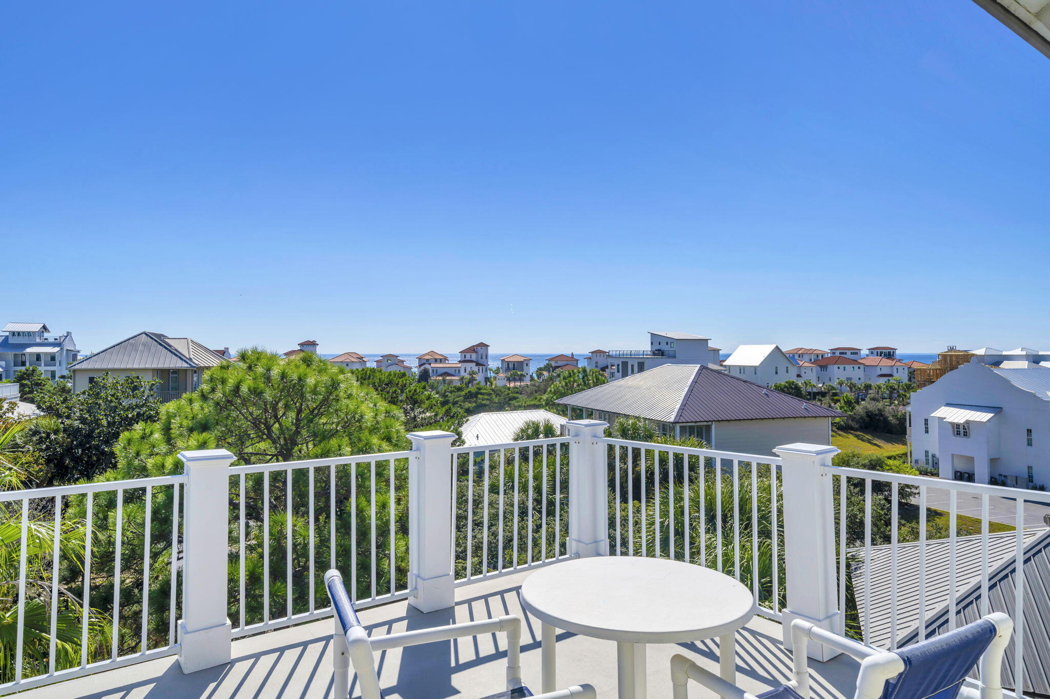 GULF VIEWS AND 3 PUBLIC BEACH ACCESSES WITHIN WALKING DISTANCE!  Come see this 3 bedroom, 3 bathroom home PLUS loft in the quaint neighborhood of Calypso Pointe.  This one owner home is tucked away in serene surroundings with wrap around covered porches.  Inside is an open living/dining and remodeled kitchen with shaker white cabinets, quartz countertops, stainless-steel appliances and breakfast bar. Main floor en-suite and laundry room.  Upstairs is the master bedroom and another large bedroom, one with private balcony.  Spacious enough to add additional beds for increased rental income.  The highlight of this home is the loft that not only adds additional living/sleeping space and mini-kitchen with refrigerator but includes a large deck overlooking the beautiful Gulf of America. Step outside to the shaded porches or down the street to the community pool.  Or take a stroll to Dune Allen or Ed Walline Beaches.  The owners have updated the kitchen and baths, resurfaced the epoxy decks, replaced some wood railings and flooring to add trex-decking, removed popcorn ceilings, replaced the exterior loft door, replaced roof in 2020, HVAC 2019 and Water Heater in 2021.  No carpet here...LVP, hardwood flooring and ceramic tile.  All furnishings and decor convey so the home is rental ready!  Beneath the home is tons of storage for beach gear and bicycles. Rentals for 2024 $55,000/2025 $35,000; Rental projections of $75,000 using a property manager and not self-managed.  With a very low cost HOA, take advantage of this rare opportunity to own in a 30A neighborhood that is so close to the beach and activities!  ALL Polybutylene plumbing replaced!