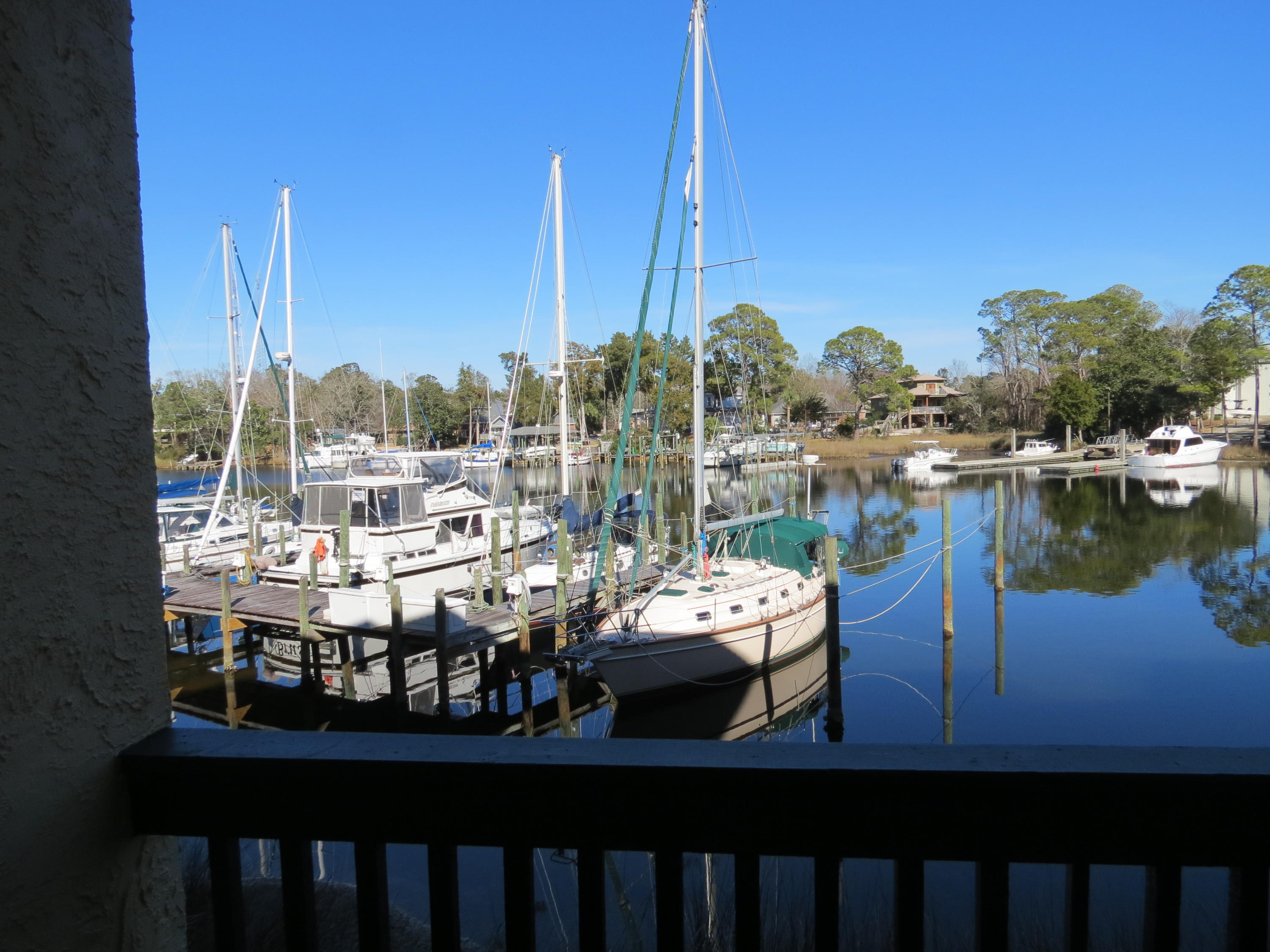 Available for immediate move in! This beautifully furnished, executive waterfront studio includes utilities. Wake up to the amazing view and enjoy your coffee on your screened-in porch overlooking the marina. There is a spacious living area/bedroom, a large full bathroom, and a kitchenette with a mini-fridge. Just bring your clothes and move in. No pets or inside smoking allowed. Cleaning fee will be required at move out.