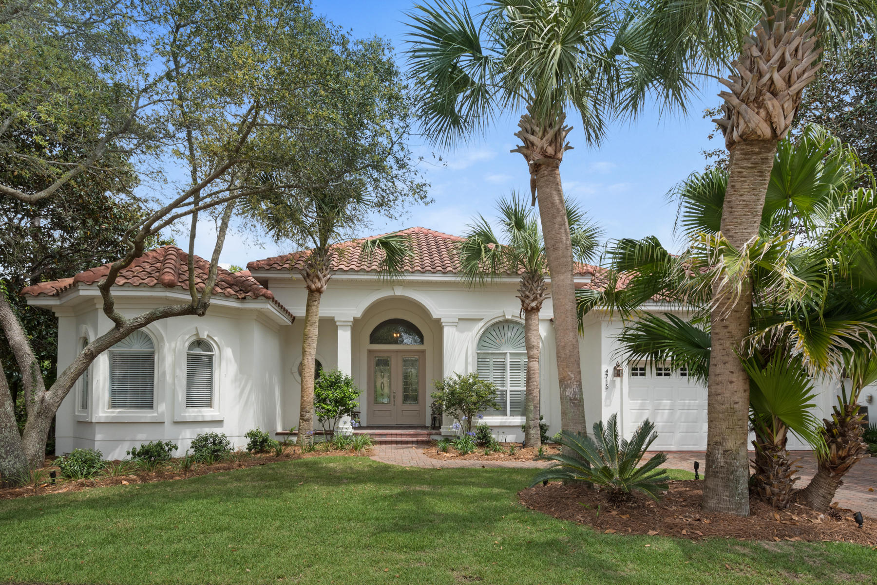Here is your chance to own an amazing home in Destiny East, one of the most sought after gated communities near Destin's beautiful beaches. All on one level, this home has many amenities including two living areas, an office, dining room, bunk room, high ceilings, crown molding, a screened porch & an outdoor hot tub. Beautiful landscaping offers back yard privacy. The interior and exterior has been freshly painted and the yard beautifully landscaped. The brand new bunk room is the perfect place for the younger family members to hang out. The master suite includes his and her closets, a large garden tub and double vanities. The open floor plan and split bedroom design offer ideal living spaces for a full time residence or vacation rental. Destiny East offers 2 swimming pools, lighted tennis courts, a club house with a club director who plans regular neighborhood socials, a gym, playground and movie theater! There are a mix of full time owners, second homes and vacation rentals. You're a nice walk or golf cart ride to the beach! Restaurants, shopping and golf courses are minutes away.