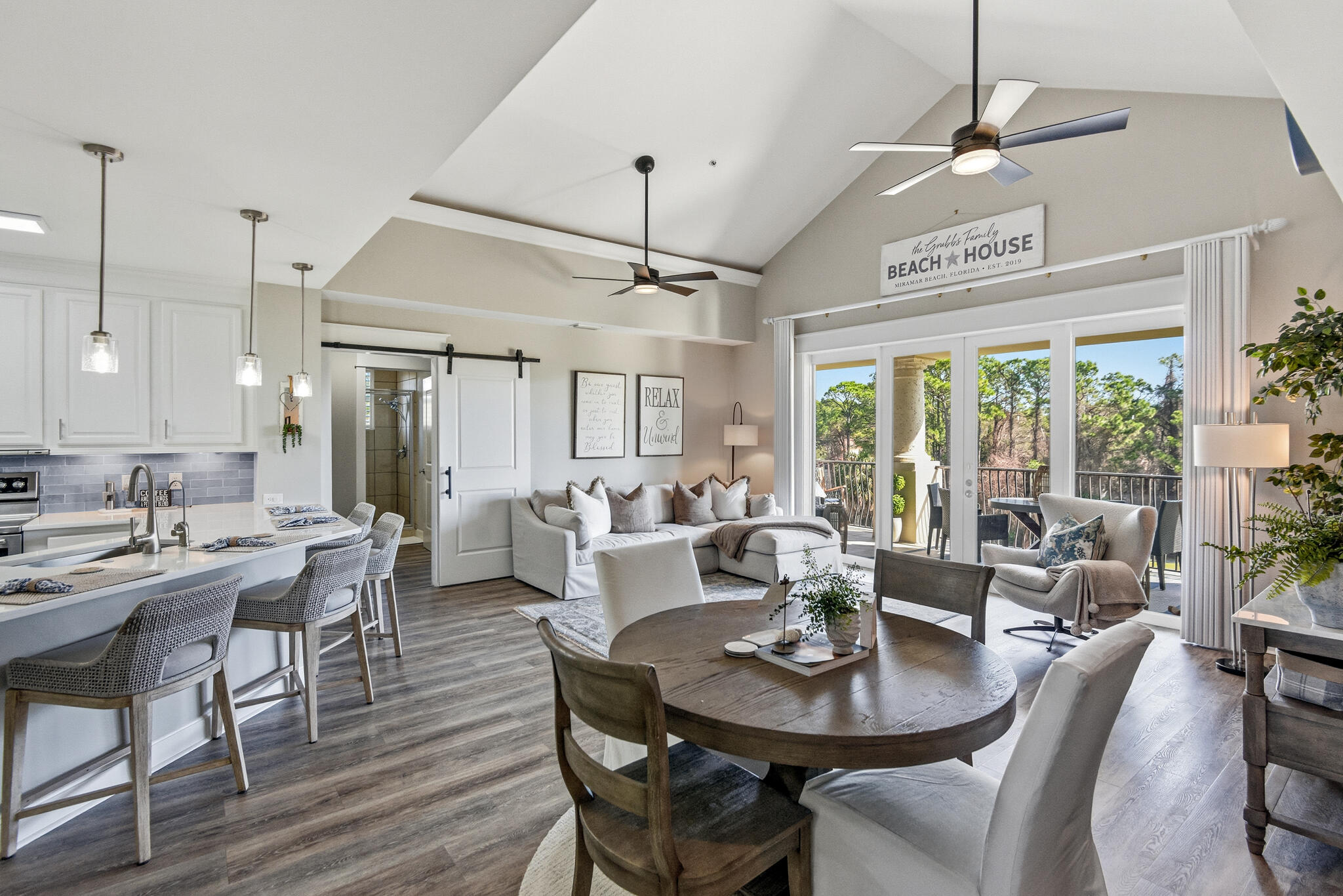 Hard to resist at this price! This gorgeous ''Resort'' home is located in a gated community in Walton County which has rave reviews. If you are not familiar with sugary looking beaches with Emerald colored water as a backdrop, you are in for a real treat as a member of the Sandestin Owners Association that offers 4 golf courses, a Tennis & Pickleball Club and a Marina.  The updated flooring is awesome in this unit, and the spa-like master bath will delight you. The kitchen was recently totally renovated and features a double oven. One great feature you will surely love is the water system that equates to filtered water everywhere. This location is only a short golf cart ride to the Gulf of America beaches AND to fantastic shopping and dining. Not only will you enjoy the layout of this condo, you will truly love the gorgeous furnishings that will excite you the moment you open the front door. There is definitely high-end furniture included. You will also own a private single garage, but this unit comes with your personal golf cart as well. Slow down while you enjoy a cup of coffee and a great book on the roomy balcony that overlooks the golf course. Florida residents do not pay state income tax, so that is one more reason to make this your homesteaded property. Should you want it for your part time use, you would also have the option to rent it out. Short term rentals are allowed in this association. Sellers have receipts for close to $200,000 on the improvements made during their ownership. Too numerous to mention here, a detailed document is available on request, and you won't be disappointed!