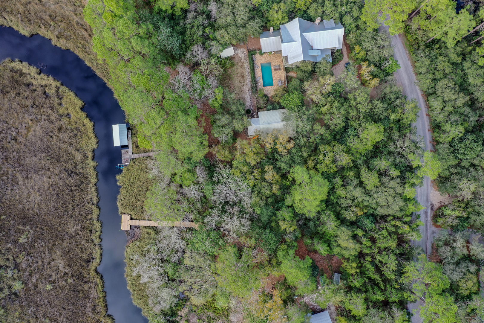 Presenting an exceptional opportunity to own your WATERFRONT piece of paradise. Build your dream home on this rare .75 acre, waterfront lot, located in the lovely community of Bay Magnolia. This property features a dock, paid water tap fees, and 132 feet on the deep water McQuage Bayou, leading to the Choctawhatchee Bay. Bay Magnolia is less than 4 miles to the beaches of 30A and just a quick walk to the peaceful trails of Point Washington State Park. The neighborhood features a community dock, gazebo and bay front beach. There is no build out time and very low HOA fees. The quality of construction and design of homes continue to remain exceptional, with the input of an experienced design review board. Don't miss building your dream home in this delightful and enchanting community!