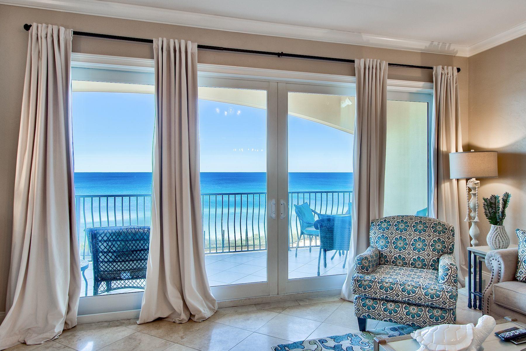 Ideally situated in the gated gulf-front community of Adagio, this recently-remodeled vacation condo is a serene beach retreat with luxurious finishes. Offering 2,200 square feet of living space, open-concept living areas feel airy and inviting. Exquisite views of the Gulf of Mexico can be enjoyed throughout the unit, which also offers an expansive balcony for outdoor dining and entertaining. Notable updates include new flooring, designer decor, and new counters. An inspiring setting for preparing meals, the fully-equipped kitchen features high-end Viking appliances, quartz countertops, ample cabinetry, and a large breakfast bar. The master suite enjoys private balcony access and direct gulf views, while the master bath provides a luxurious place to rinse off sugar-white sand with a walk-in shower and soaking tub. Three additional bedrooms provide plenty of space for hosting family and friends. Residents of Adagio receive access to exclusive amenities that include an 8,000-square-foot lagoon-style pool, a hot tub, a fitness center, meeting rooms, and a gulf-front infinity-edge pool that is heated and open year-round. View stunning sunrises and sunsets over the water from the spacious balcony, and enjoy direct access to infamous white-sand beach and emerald green waters.