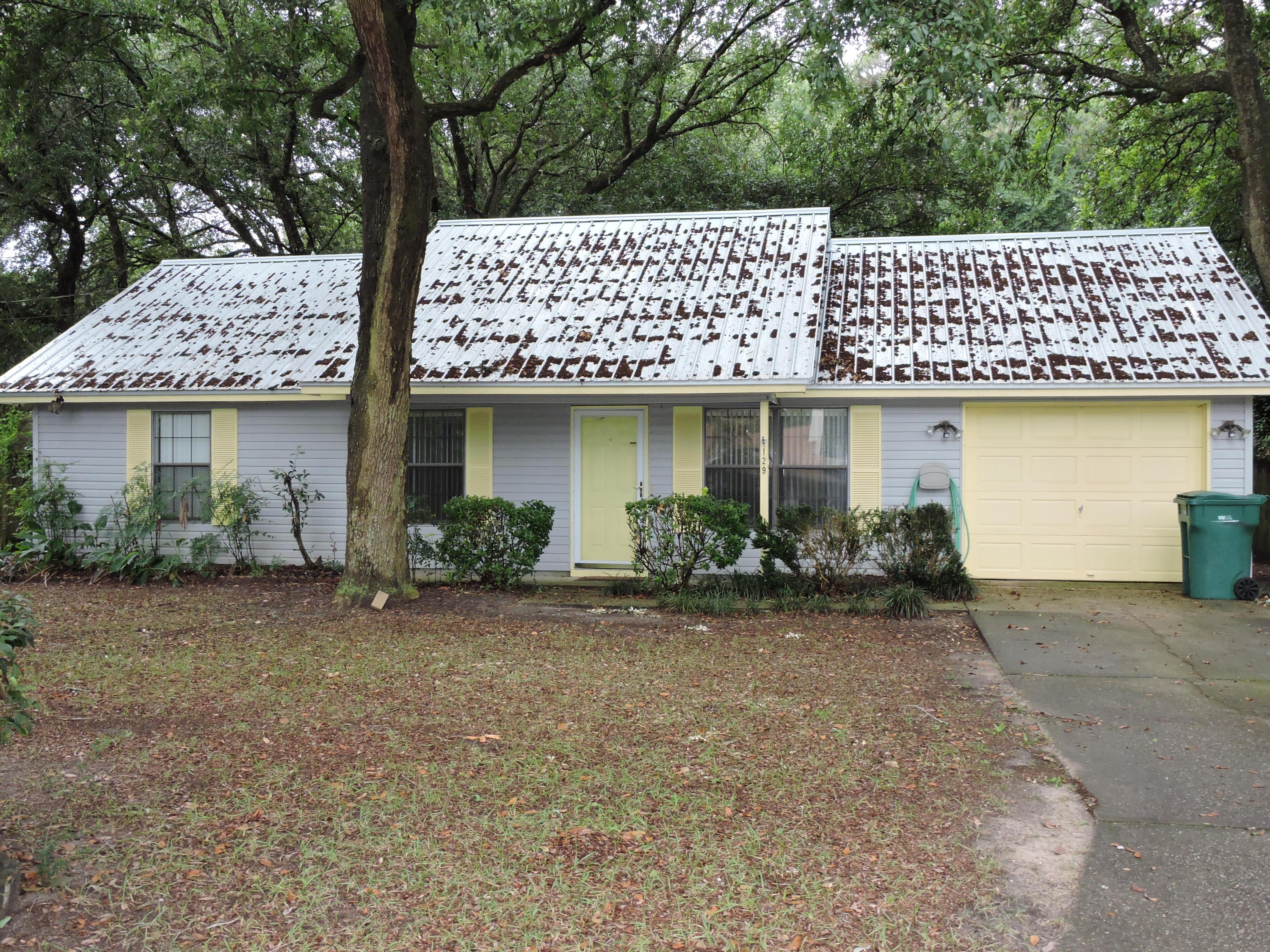 Available NOW! The home is located South of I-10 with a shaded large flat lot situated on a cul-de-sac. The home has been recently painted and tiled throughout with updated light fixtures. The home features a semi open concept living/dining/kitchen area. The bedrooms are niced sized with ample closet space. There is a screen in porch on the back of the home where you can enjoy your morning coffee. Schedule your showing today!