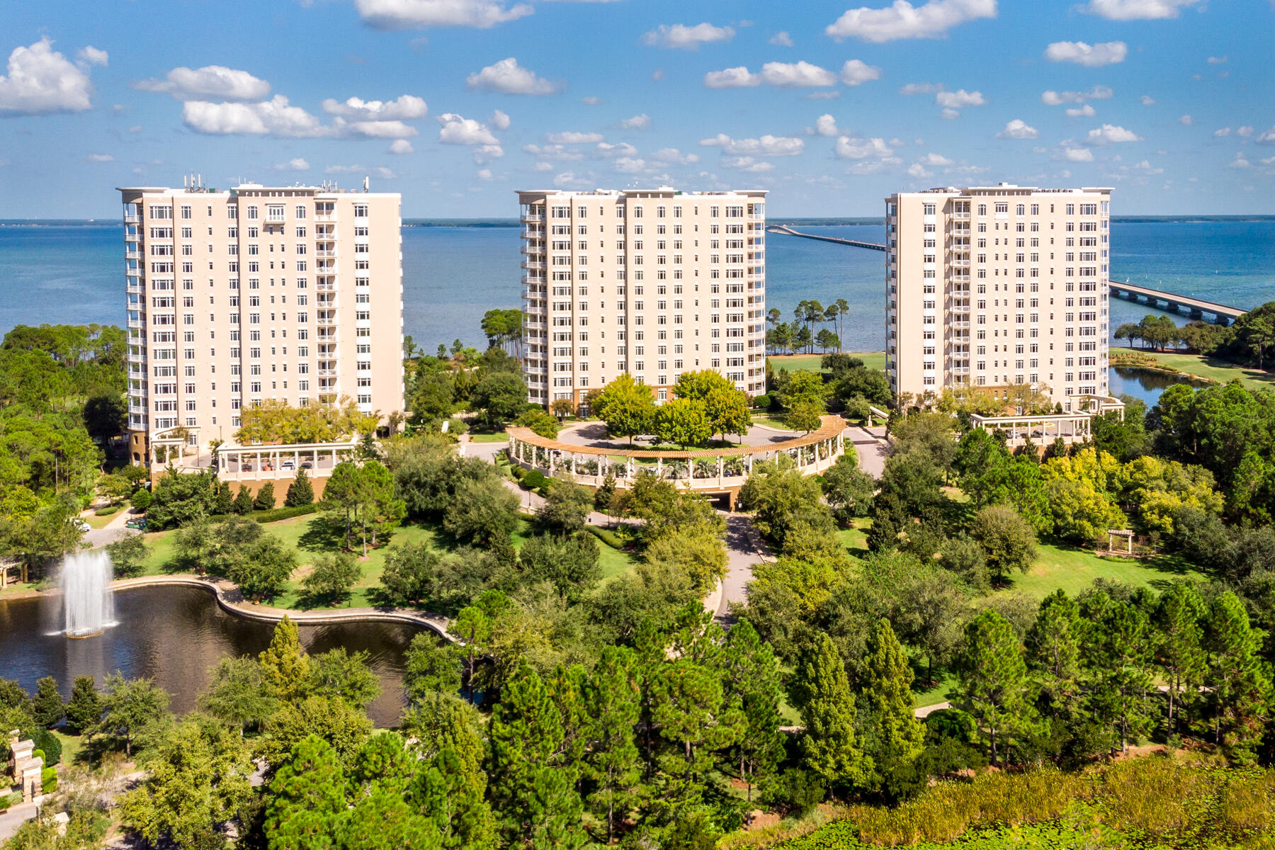 Beautifully updated condominium residence that offers exceptionally private, secured, quiet, and sensible livability!  Its expansive floor plan is more indicative of a one-story house than a typical condominium; although, when you depart for travel, you simply turn the key and realize the confidence in a phenomenal onsite management team that is established to watch over your investment in a fabulous lifestyle.  Unit 1511 of building 3, the western-most building of the exclusive enclave known as One Water Place, the most extraordinary condominium community within the private gates of Kelly Plantation, yields the most desired floor plan, known as The Castleton, measuring approximately 3,220 square feet, atop the most premier stack, featuring...