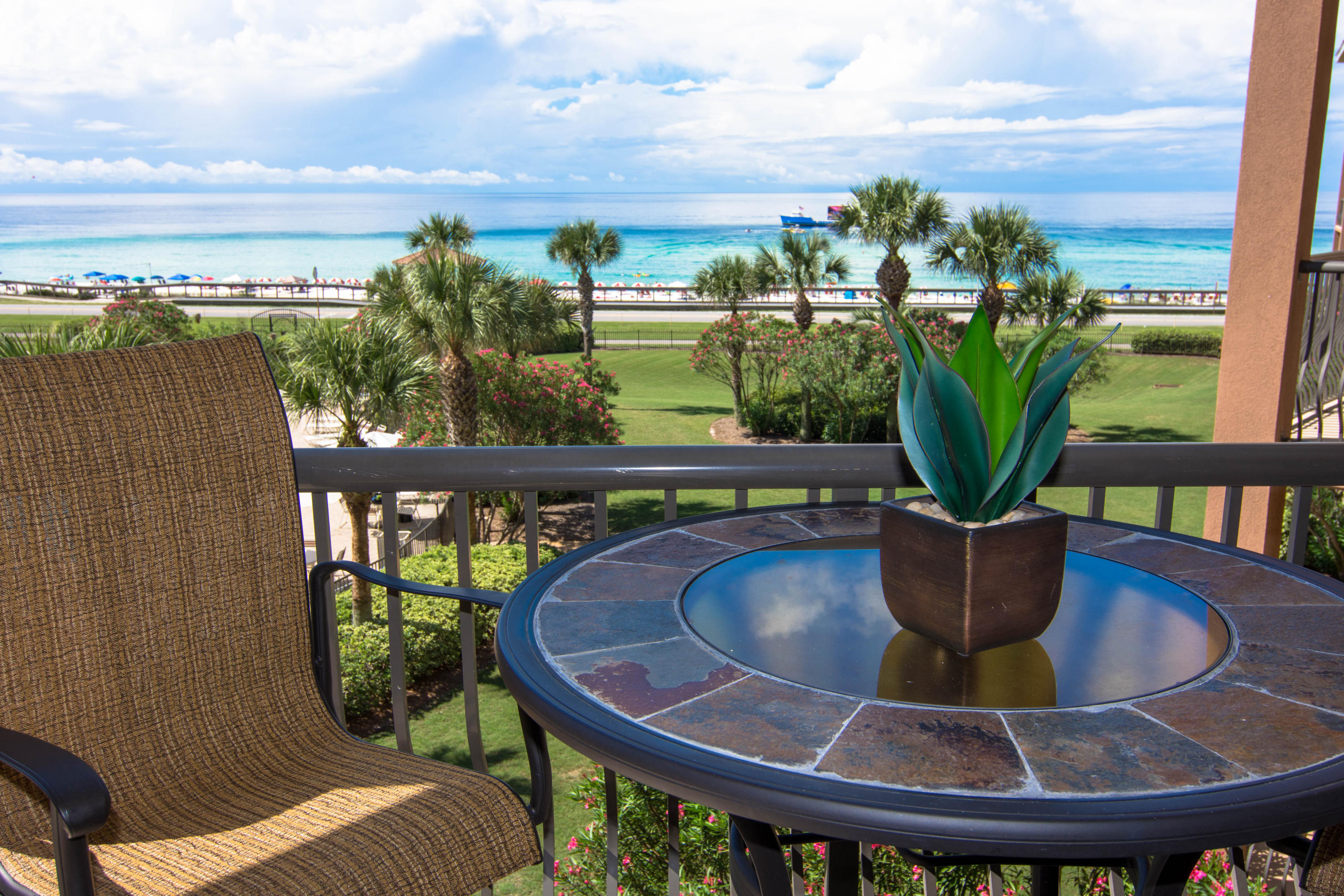 Luxe beach living in this impressive condominium at Mediterranea. This 2 bedroom, 2.5 bath condo is incomparably luxurious and timeless in its elegance. Enjoy 2 deeded covered parking spaces, 2 private balconies, a Gulf view/front master suite, a 2nd guest suite with ensuite bath and private balcony, powder bath and a beautiful gourmet kitchen featuring granite counters and stainless steel appliances plus a large walk-in pantry. This condo is being offered fully and beautifully furnished and includes tile floors throughout the entire condo. Currently a second home and in excellent condition  but would be a rental powerhouse! Partake in all the. resort style amenities Mediterranea has to offer you and your guests, including nearly 500 feet of gated beachfront, private beachfront observation gazebo, fully-furnished community room with full kitchen and terrace overlooking the Gulf, fitness center, tennis court and nearly 3,000 square foot seasonally heated pool and spa surrounded by the 7,000 square foot pool deck and lush landscaped grounds.