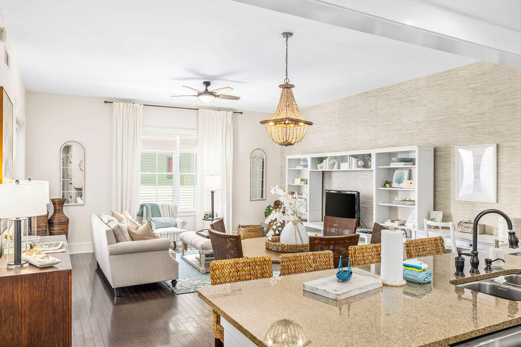 Incredible 3 bedroom 3 bathroom unit in the highly sought-after community of Blue Mountain Beach. Unit M2-316 is located in Redfish Village and is being sold mostly furnished and rental ready. The condo features hardwood flooring throughout and granite countertops in the bathrooms and kitchen. The kitchen is fully equipped with stainless steel appliances and bar seating. The unit has a spacious outdoor balcony that can be accessed from the living room and the master bedroom and views of the pool and courtyard from the front door. Private beach access is a short stroll away and Redfish Taco, the onsite restaurant, can be enjoyed for lunch and dinner with live music. Situated in the heart of Blue Mountain Beach, Redfish Village is steps away from shopping, dining, entertainment and the sugar white sands of the emerald coast beaches. Amenities include a large resort style pool; private beach access with beach service, parking, bathrooms and showers; a lake side dock; owner's lounge, fitness center, playground; outdoor grilling area and covered parking.