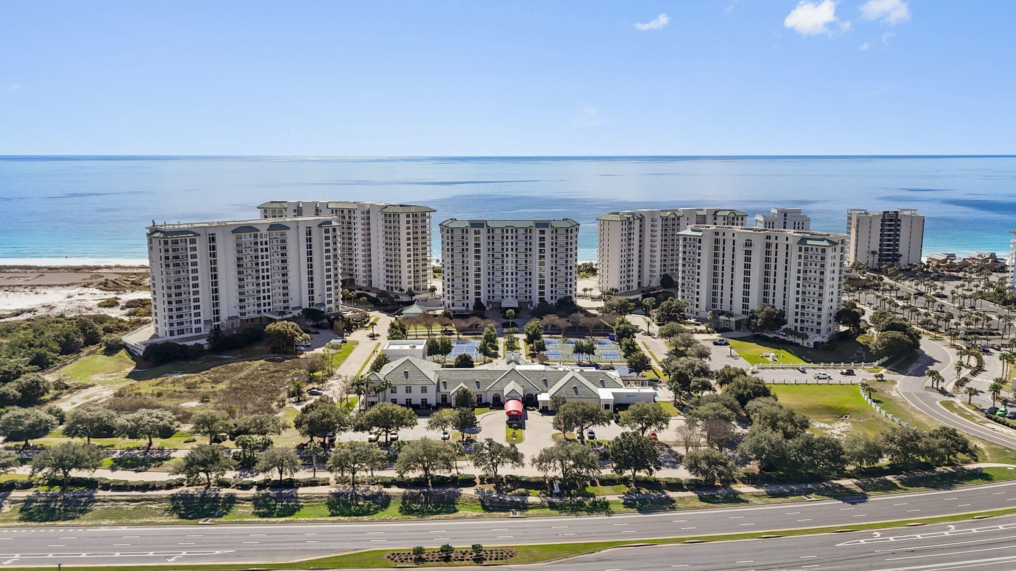 Luxury coastal living in the heart of Destin at Silver Shells. Convenient access ground floor unit with sought after 11-foot ceilings and large patio. Perfect for entertaining while overlooking the resort style 7500 SqFt. lagoon pool and 1,000ft of private beach.
Inside, you'll find an open living space filled with natural light from the huge sliding doors, highlighted by coastal décor, and thoughtful upgrades throughout. The living area flows seamlessly into the dining space and kitchen where you will find stainless appliances. Elegant bedrooms to retreat into with a fresh remodel of master bathroom with garden style tub. This unit comes fully furnished and ready for fun with the family. Other amenities include tennis, spa, fitness center, playground. Call Conor Gillespie (850) 687-1319