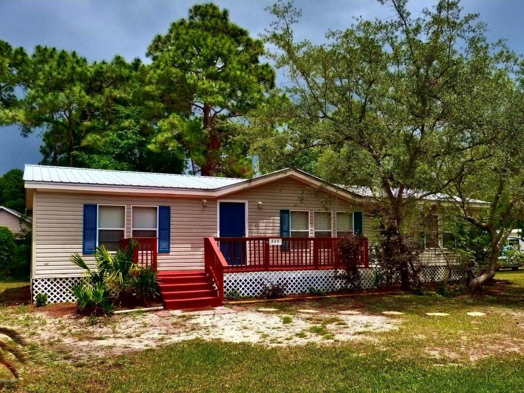 Boat and fishing deeded access at dock with this 3 bedrooms 2 baths split floor plan, large eat-in kitchen, dining room, master bath separate shower, double vanity, JET TUB, living room fireplace, all situated just steps to Mack Bayou with deeded access to water! Large lot with a natural vegetation barrier area in rear is partly fenced and has a sprinkler system from deep water well plus an outbuilding. There is a separate entrance to laundry/mud room. This move-in ready home - maintenance free home - and yard will have you bbqing, fishing and relaxing this summer. New or like new hvac, roof, interior paint, exterior decking and newly paved road with drainage built in!
  This is a modular home with fireplace, deep water well, yard building. While modular homes are manufactured, they are attached to land permanently and not moved or mobile. They are also manufactured to meet local code and mobile homes are only built to federal codes. Please view this home, its charming and situated among an are of nice homes with good values and really well built. Road was recently paved and has water control underground services.