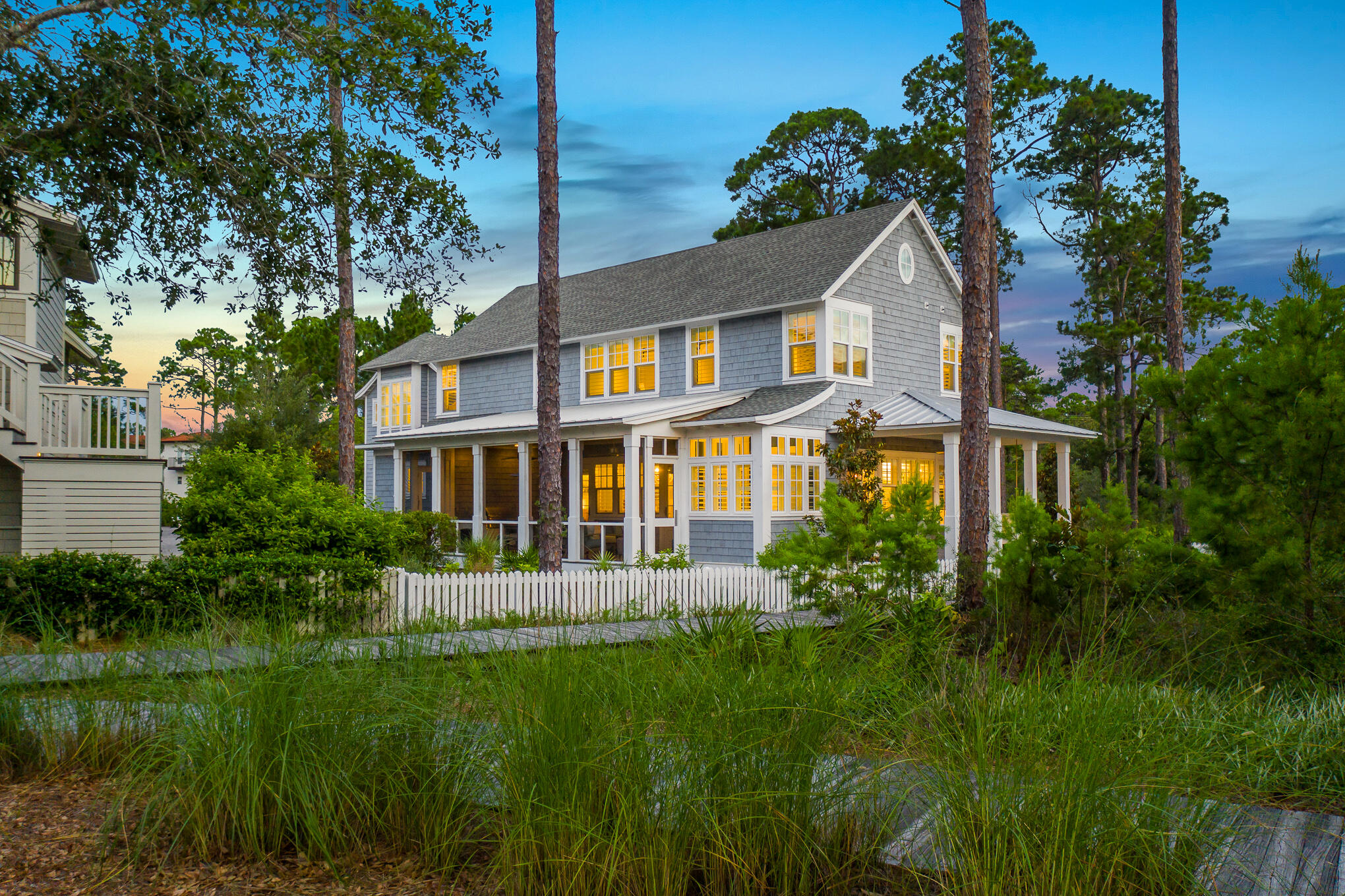 Gorgeous home in Watersound West Beach! 

Comfortable beach living at its finest is on display in this beautiful beach house.  At 3,568 sq. ft. of living space, complete with 4 bedrooms and 4 1/2 baths, plus an additional free-standing carriage house, this home offers plenty of room for the whole extended family, and thoughtful design features create a sense of relaxed luxury throughout.  The first floor boasts a well-appointed chef's kitchen, open floor plan, and a luxurious primary suite with spa bathroom that includes an oversized soaking tub, steam shower, and double closets.  Upstairs offers two additional bedrooms with ensuite baths, as well as a bunk room that includes 4 bunk suites. The carriage house features a two-car garage with plenty of storage and the additional 4th bedroom above. 

Designed with the intention of maximizing year-round indoor/outdoor living, the house is situated privately at the back of a quiet cul-de-sac and features two spacious porches and a picturesque boardwalk behind the house that takes you to the community pool and clubhouse, as well as the private beach access. 

With its ideal location near Deer Lake State Park and close proximity to Seaside, Seagrove, Watercolor, and The Hub, you are in the middle of all that 30A has to offer, while still being in a secluded oasis of tranquility that comes from living in a gated community.  With very limited inventory in the neighborhood and all that the home has to offer, this listing won't last long!